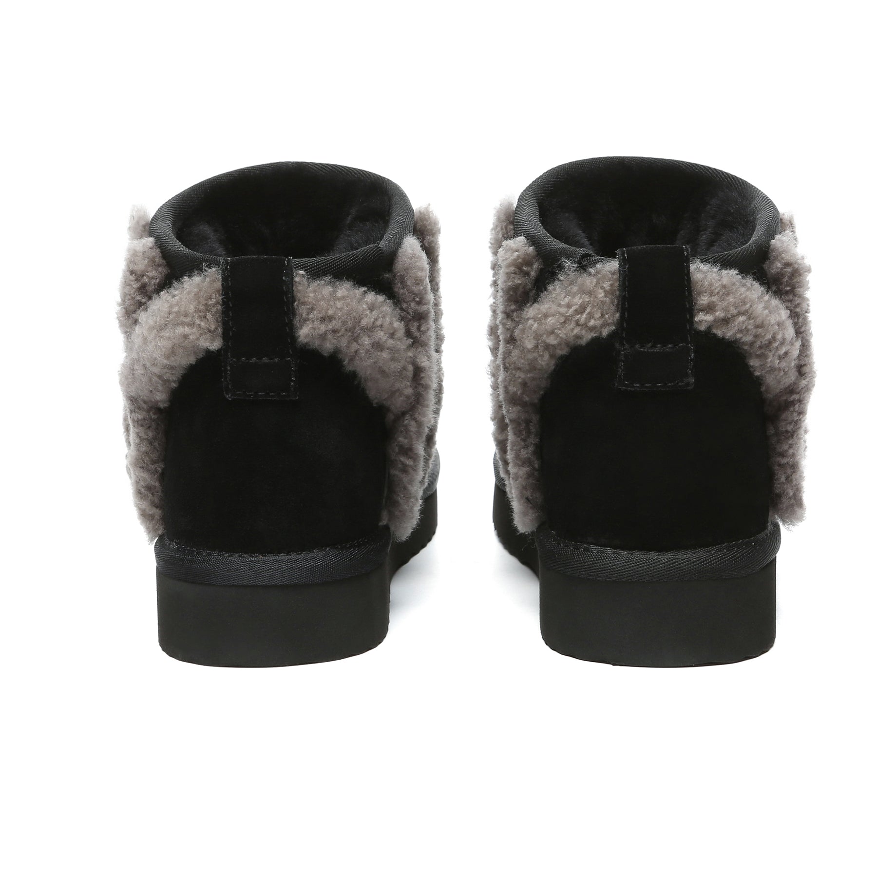 Black shearling wool side ultra mini UGG boots for women by EverUgg, showcasing the cozy shearling lining and sleek boot design.