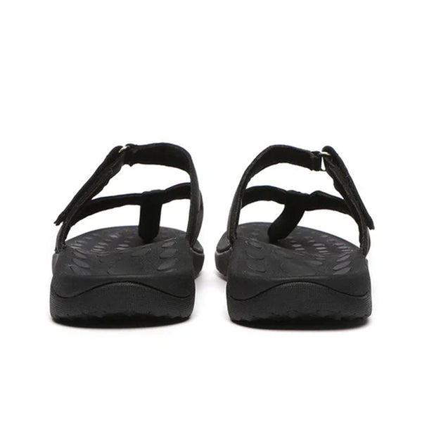 Black EverUgg Short Classic Suede UGG Boots with rounded toe and suede exterior, displayed on a plain background.