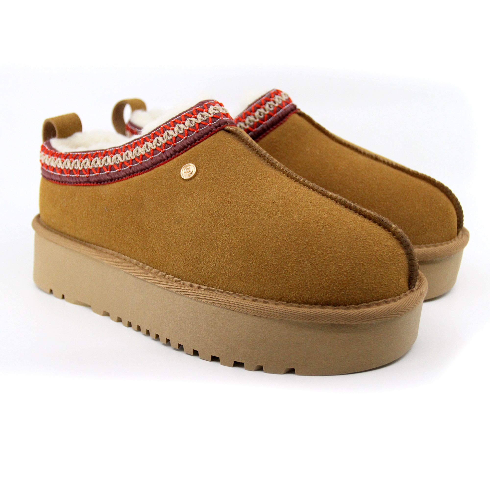 Snuggyz Alpine Platform UGG slippers for women featuring plush interior and rugged sole, ideal for cozy indoor and outdoor wear.