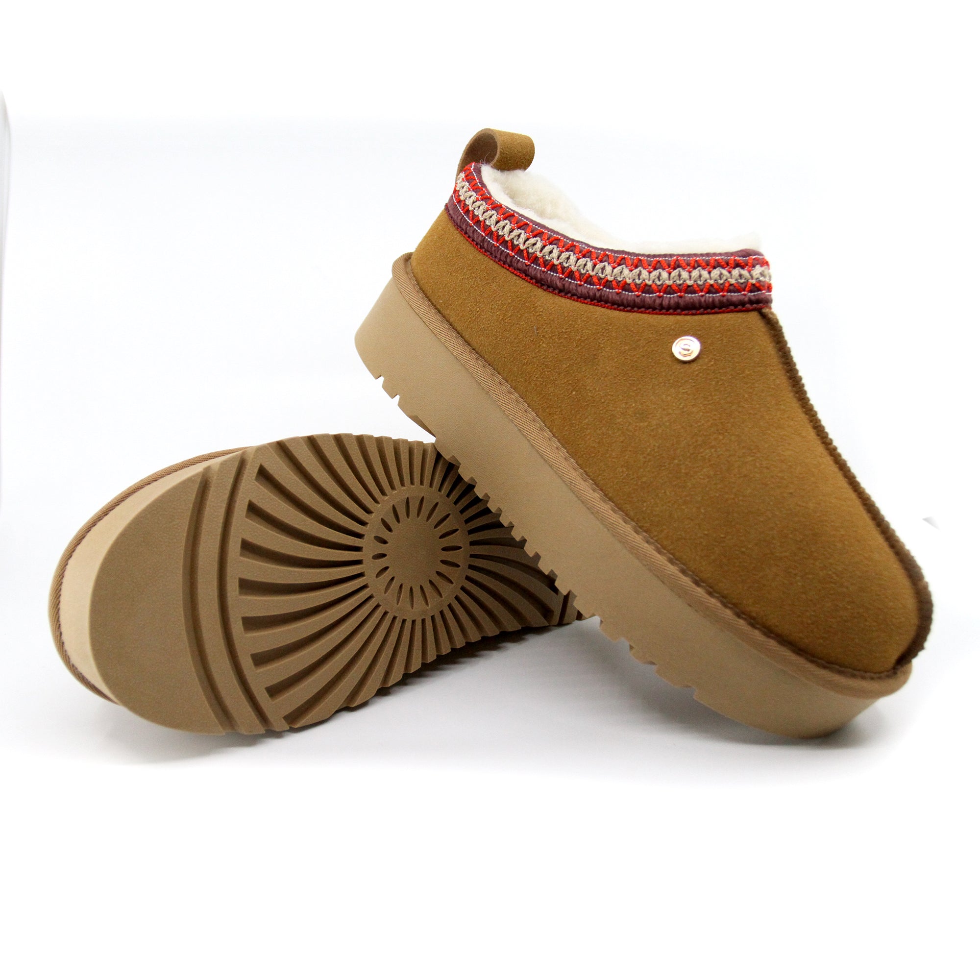 Snuggyz Alpine Platform UGG slippers for women featuring plush interior and rugged sole, designed for cozy comfort and style.