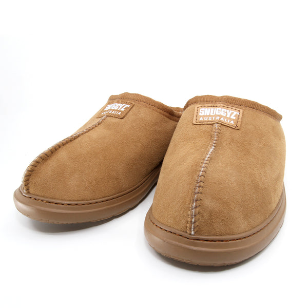 SNUGGYZ® Australian-made UGG Explorer slippers with plush interior and rugged outsole, designed for comfort and outdoor wear