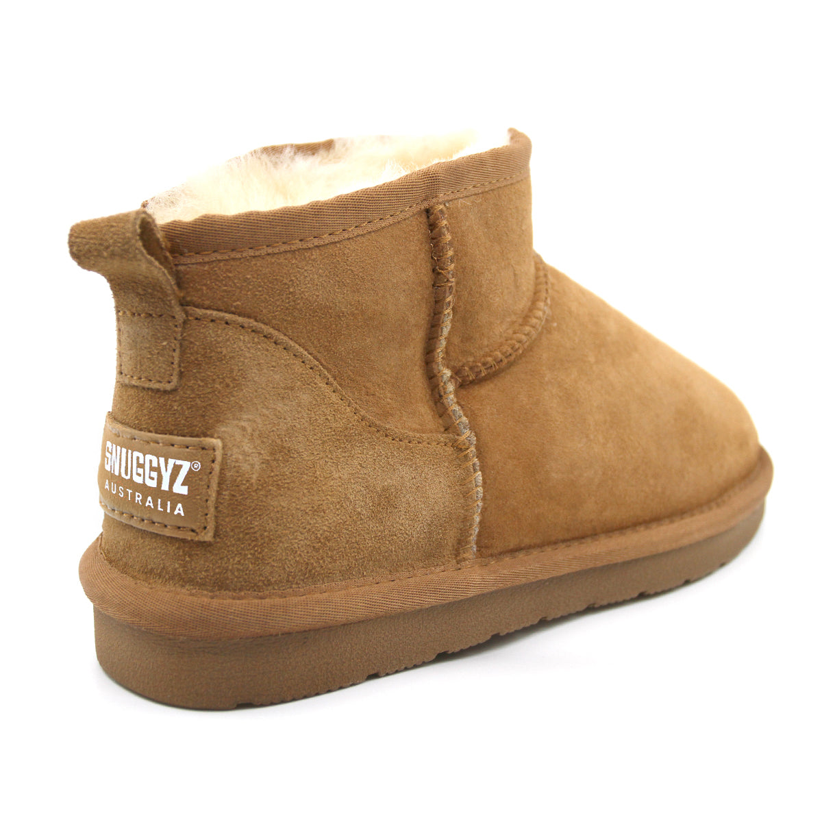 Snuggyz Premium Ultra Mini UGG Boots for women, Australian-made classic sheepskin shoes, showcasing plush tan exterior and cozy interior.