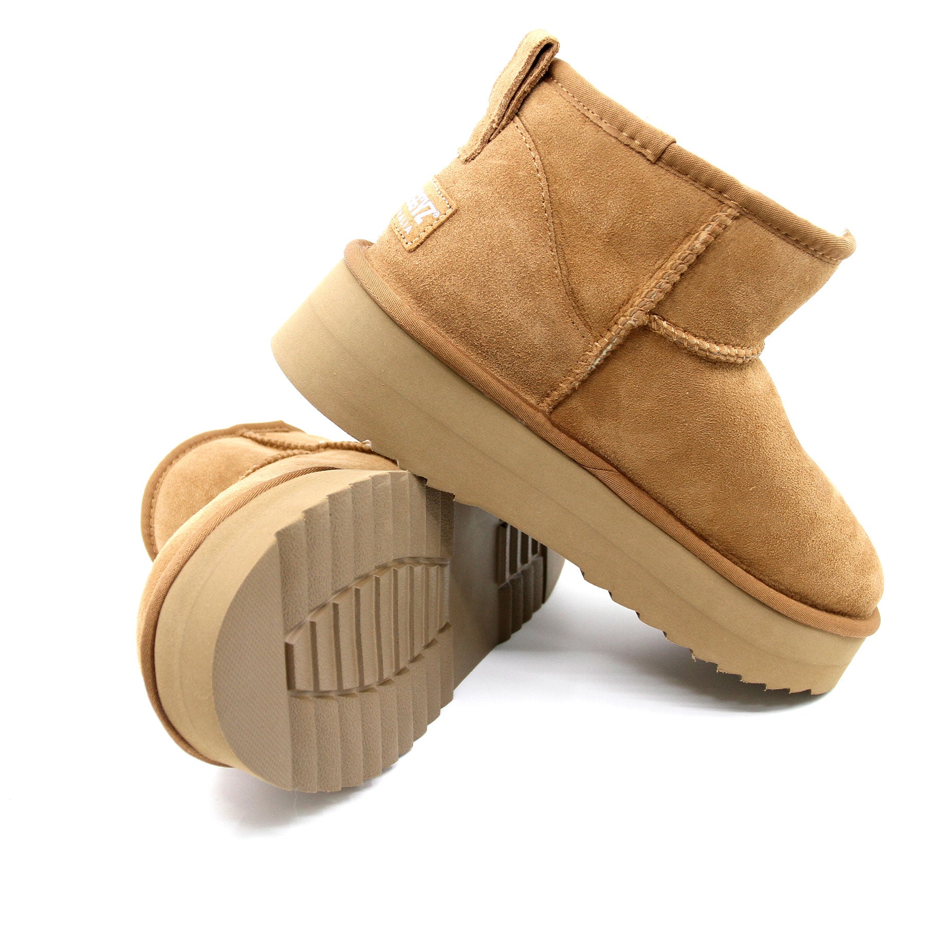 Snuggyz Ultra Mini Classic UGG platform women's boots in chestnut brown with plush shearling lining and Australian-made craftsmanship.
