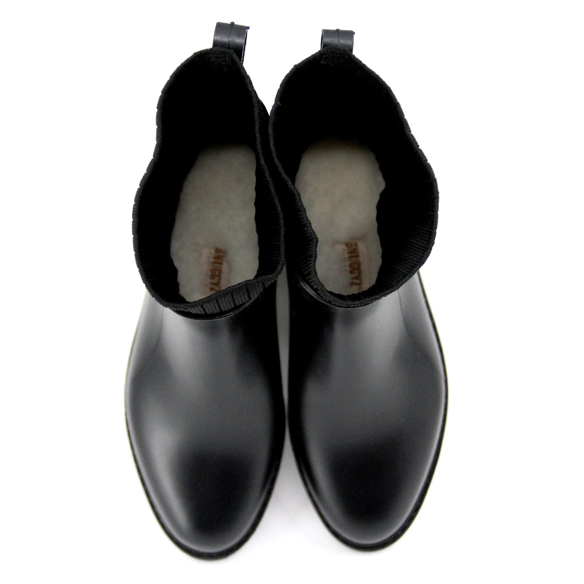 Snuggyz Urban Flex rainboots in black with textured sole and adjustable strap, designed for waterproof urban wear.