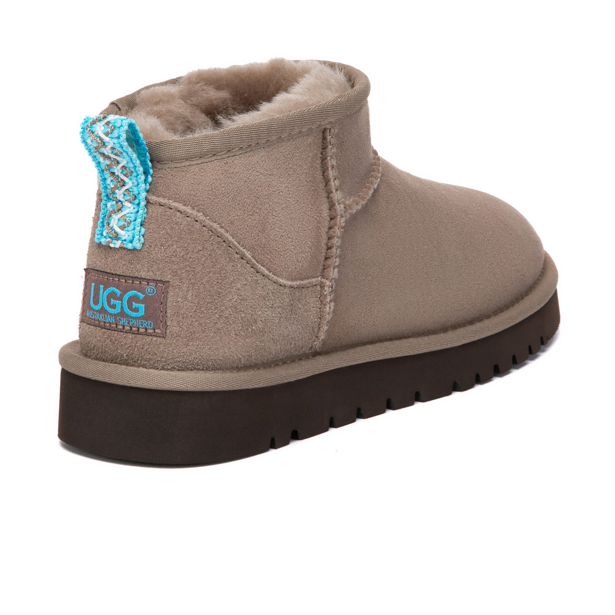 EverUgg Ultra Mini Mora UGG Boots in soft, plush material with a cozy design and short ankle height, perfect for winter wear.