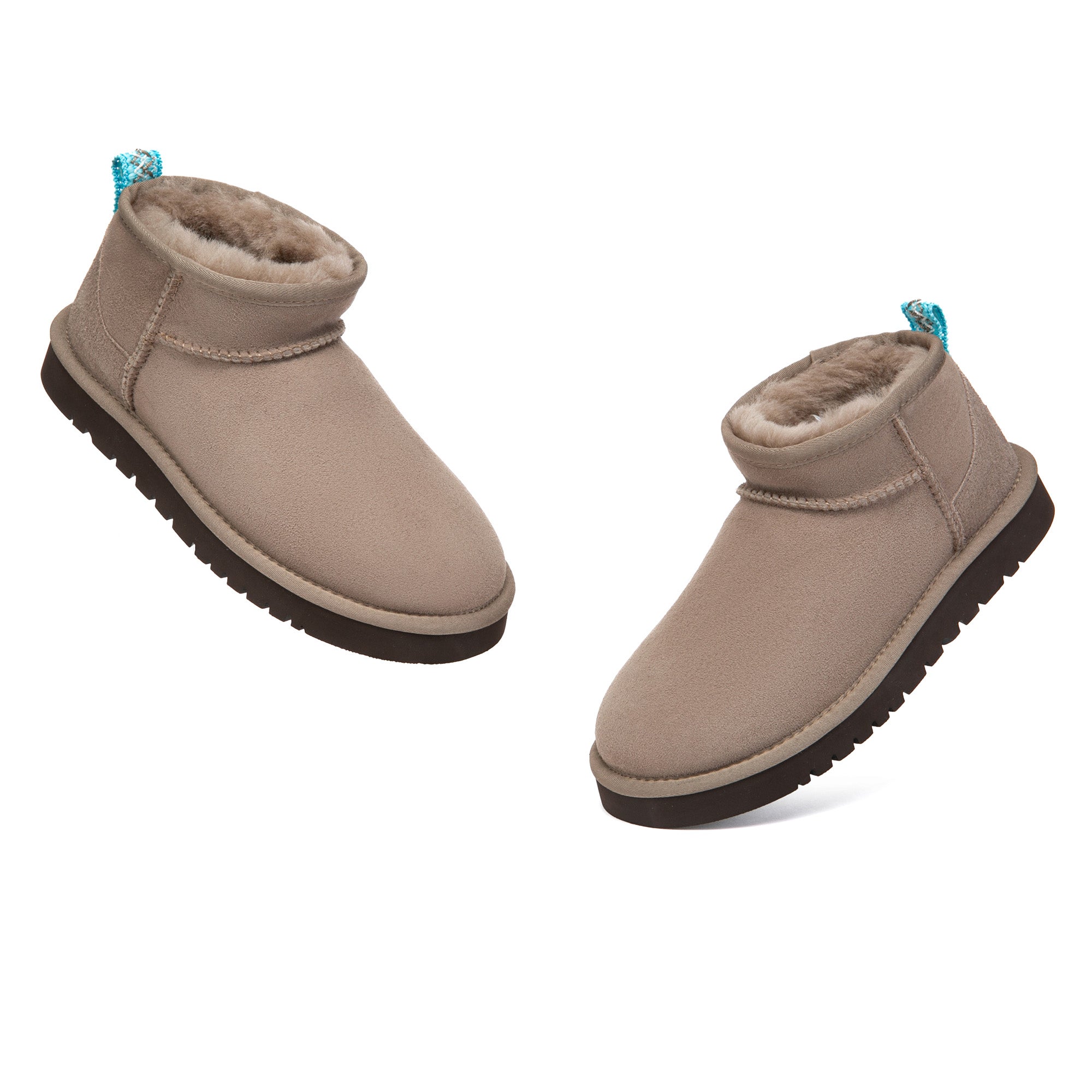 EverUgg Ultra Mini Mora UGG Boots in soft, plush material with a cozy design and ankle-length fit, perfect for casual winter wear.