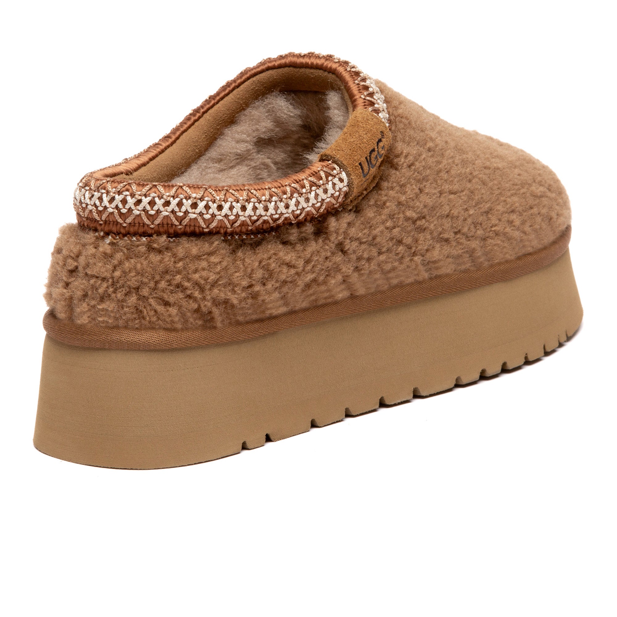 EverUgg Tazzy Furry Platform UGG slippers with plush fur and thick platform sole, perfect for cozy indoor wear.