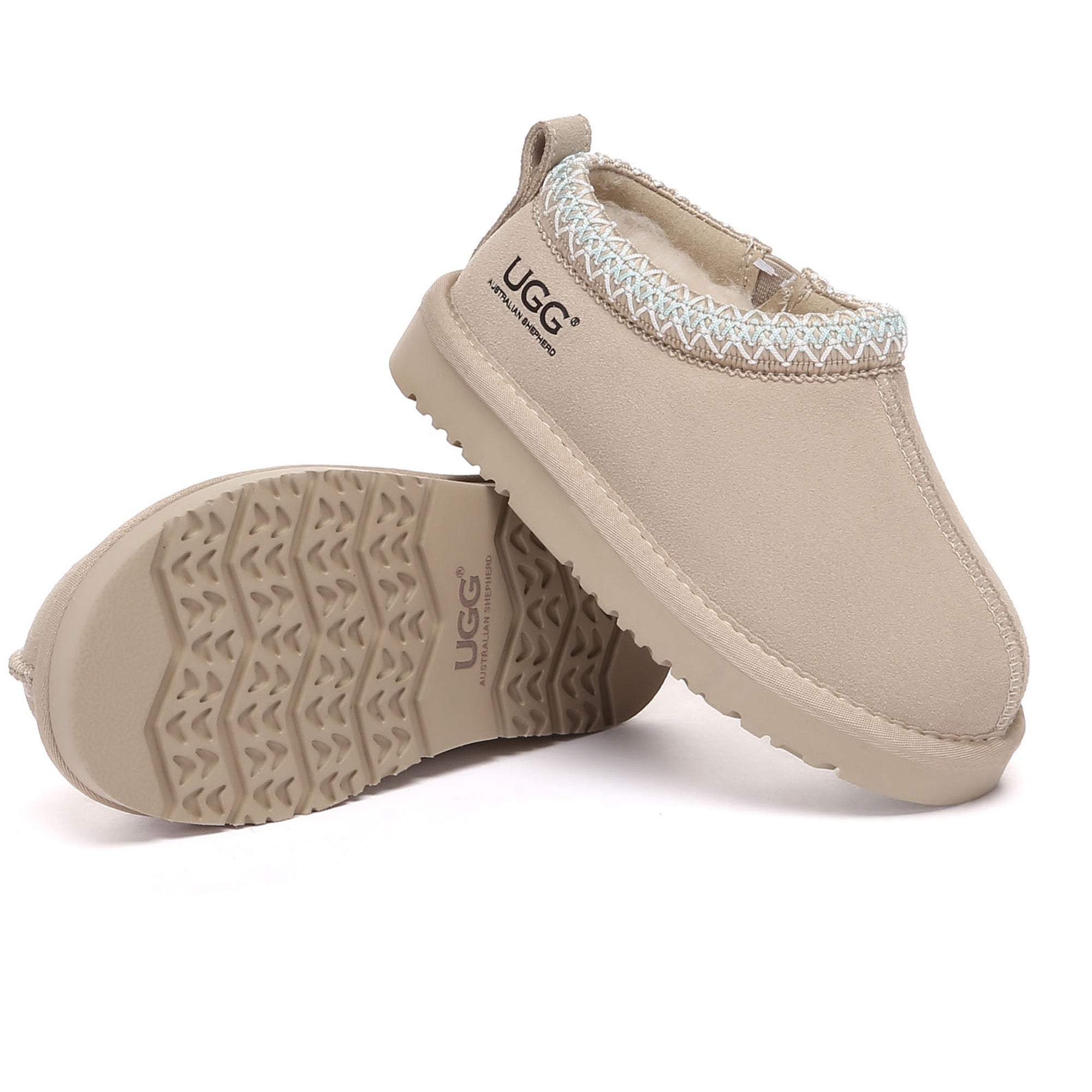 Kids' UGG slippers by EverUgg featuring soft, cozy material and a comfortable slip-on design for indoor wear.