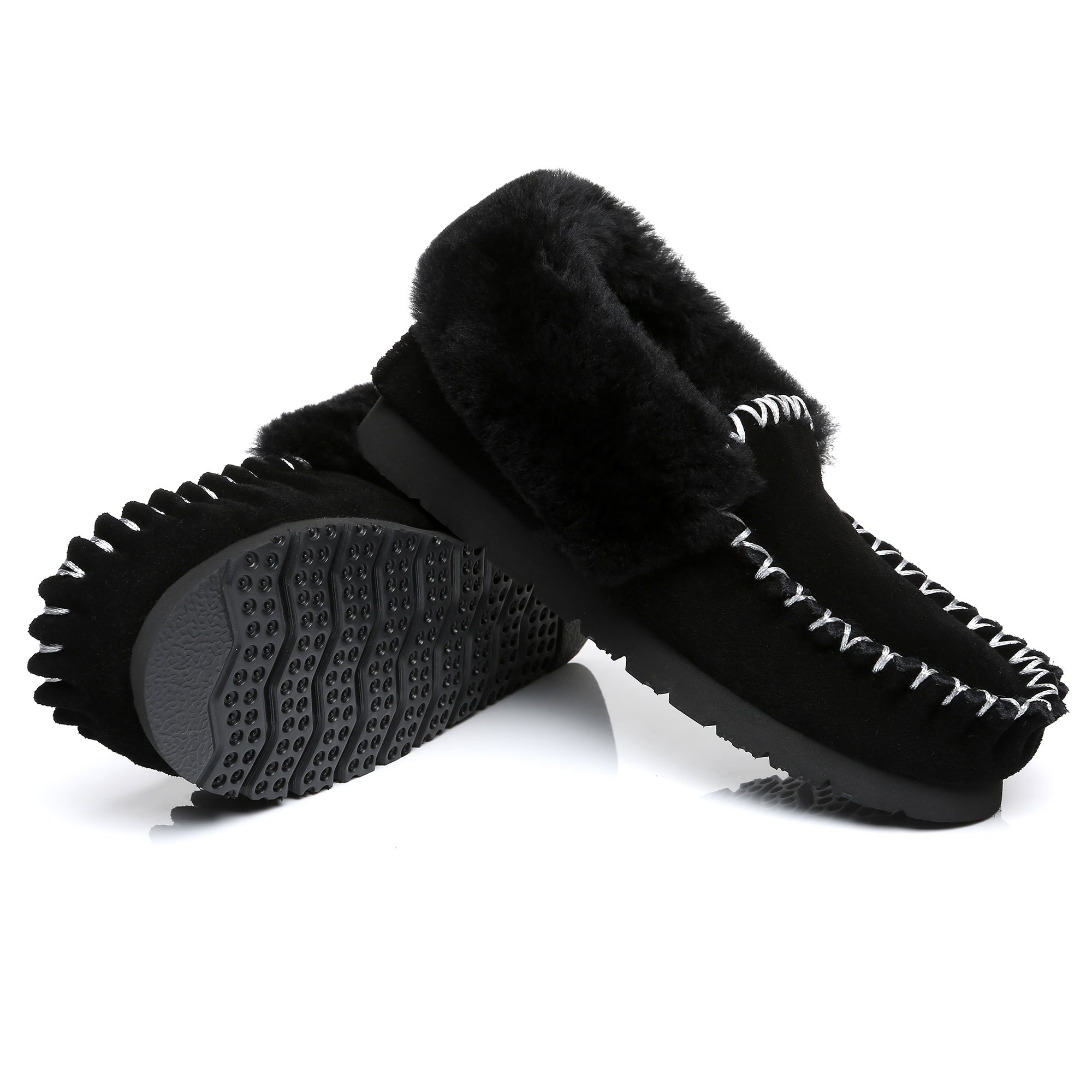 EverUgg traditional sheepskin moccasin slippers for women with soft, plush interior and classic leather exterior.