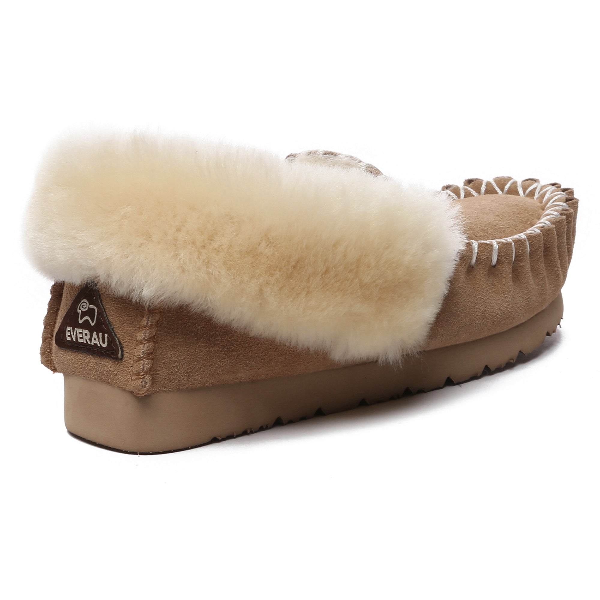 EverUgg traditional sheepskin moccasin slippers for women with soft, plush interior and tan leather exterior.