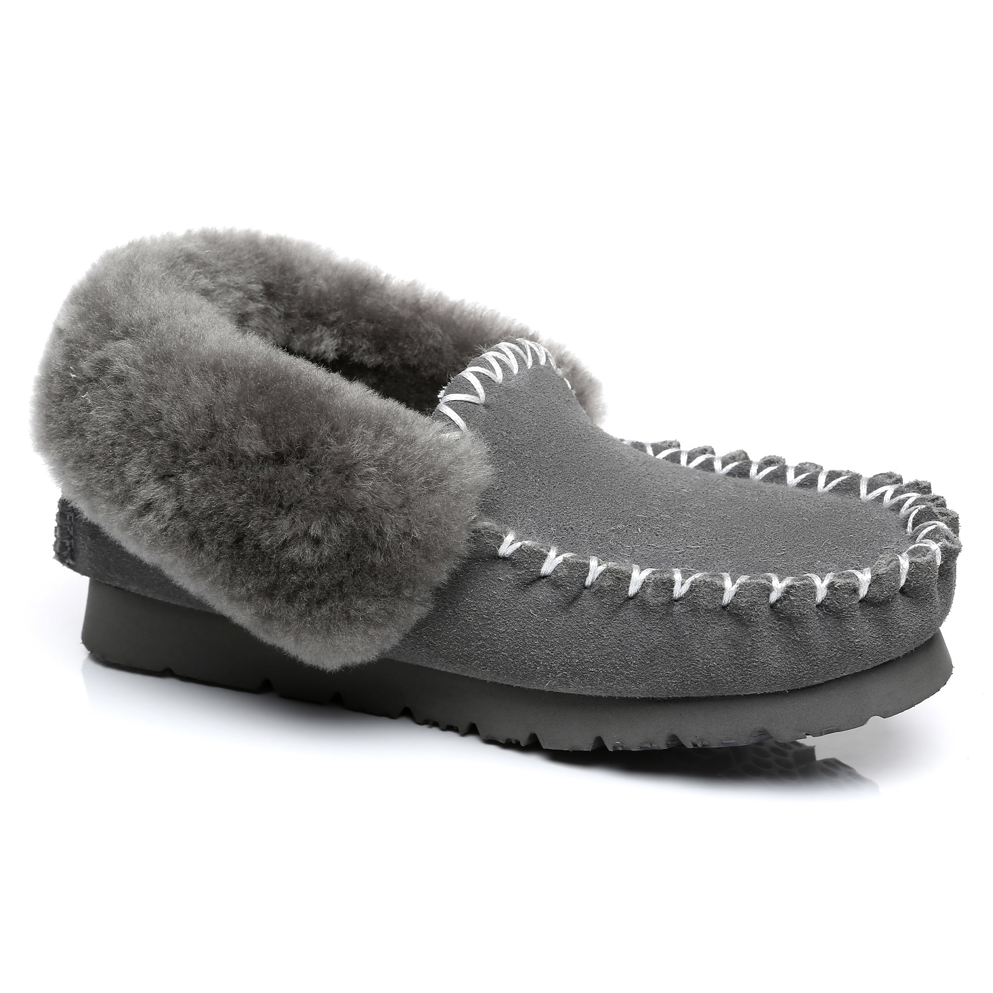 EverUgg traditional sheepskin moccasin slippers for women with soft, plush interior and brown leather exterior.