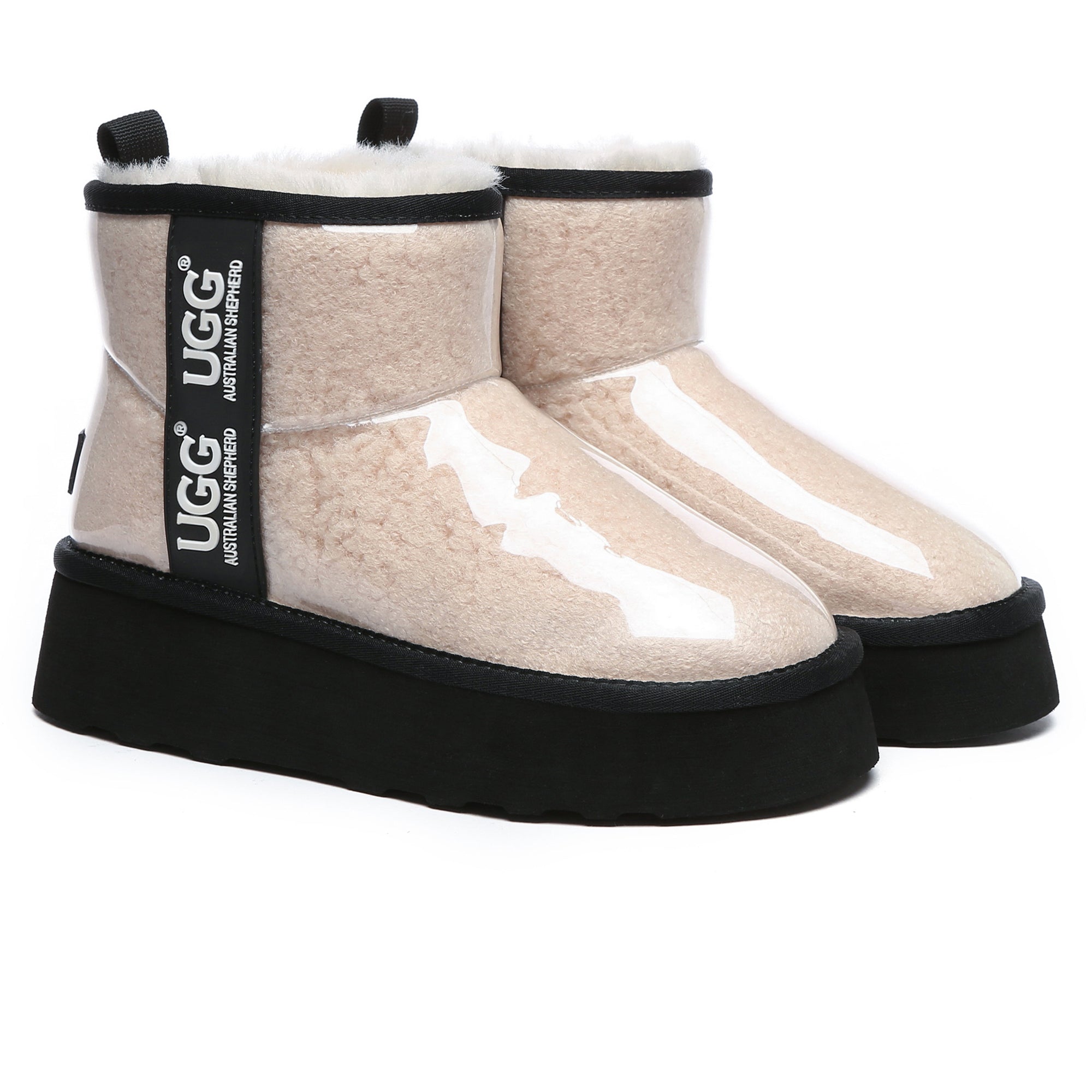 Clear transparent platform UGG boots by EverUgg featuring a sleek design and chunky sole, perfect for trendy winter outfits.