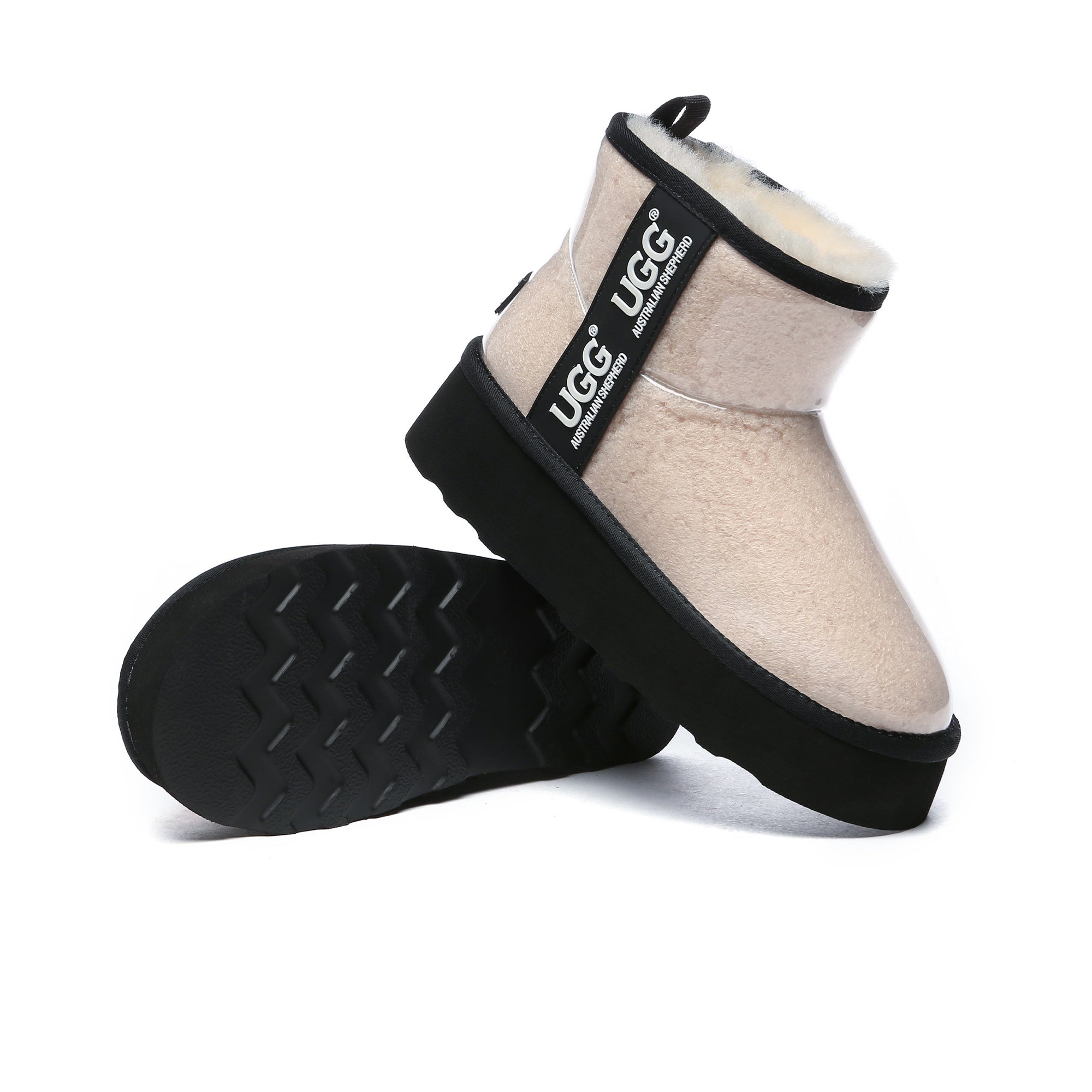 Clear transparent platform UGG boots by EverUgg, showcasing their stylish design and chunky sole on a neutral background.