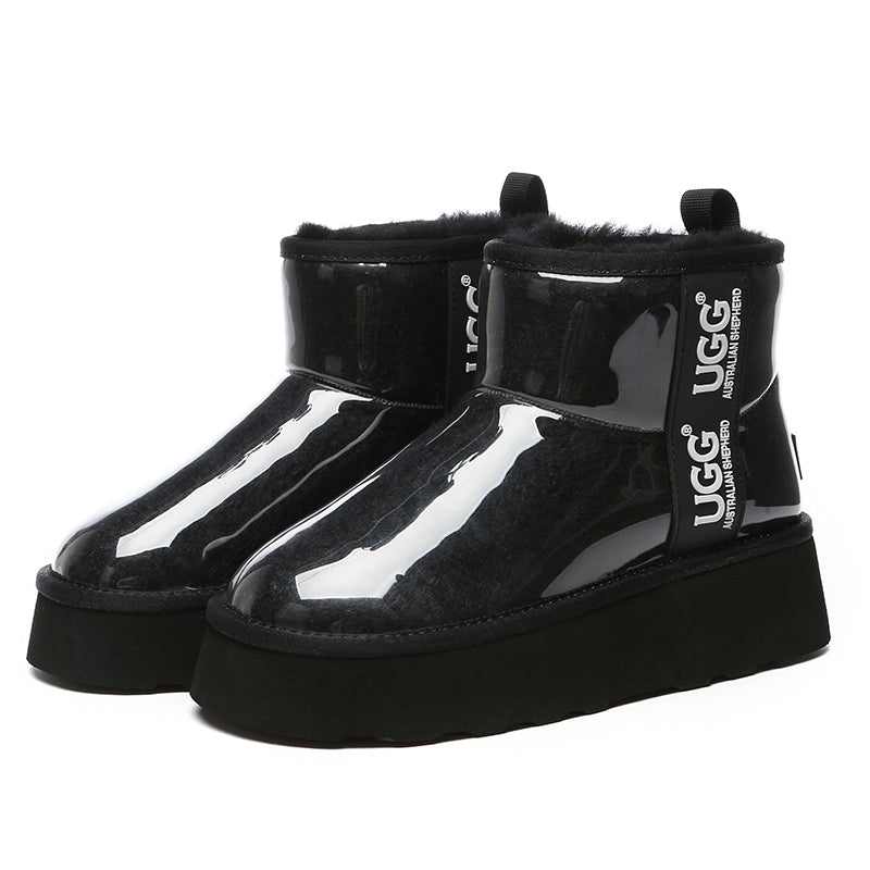 Black transparent platform UGG boots by EverUgg showing the stylish boots with clear platform soles and black upper material.