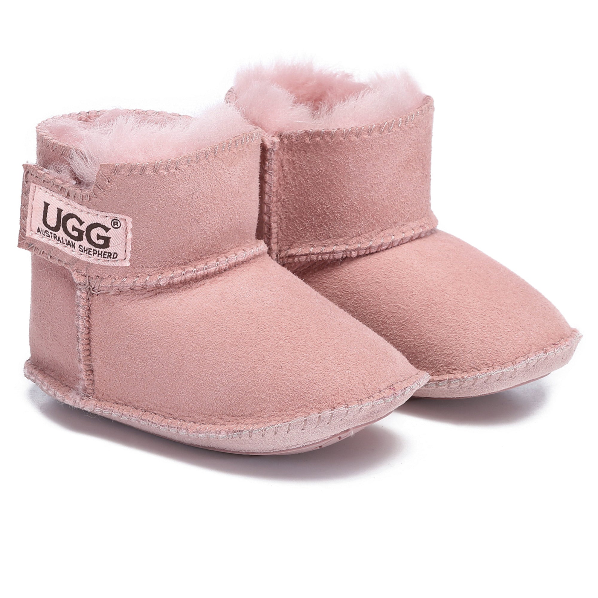 Soft beige UGG Eliana baby booties for kids by EverUgg, featuring plush lining and cozy design for little feet.