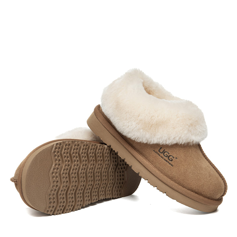 EverUgg kids ankle slippers in soft, cozy material with a rounded toe and slip-on design, ideal for comfortable indoor wear.
