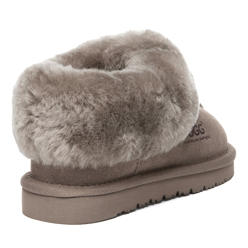 EverUgg kids ankle slippers in soft, cozy material with a plush interior and slip-on design for comfortable wear.