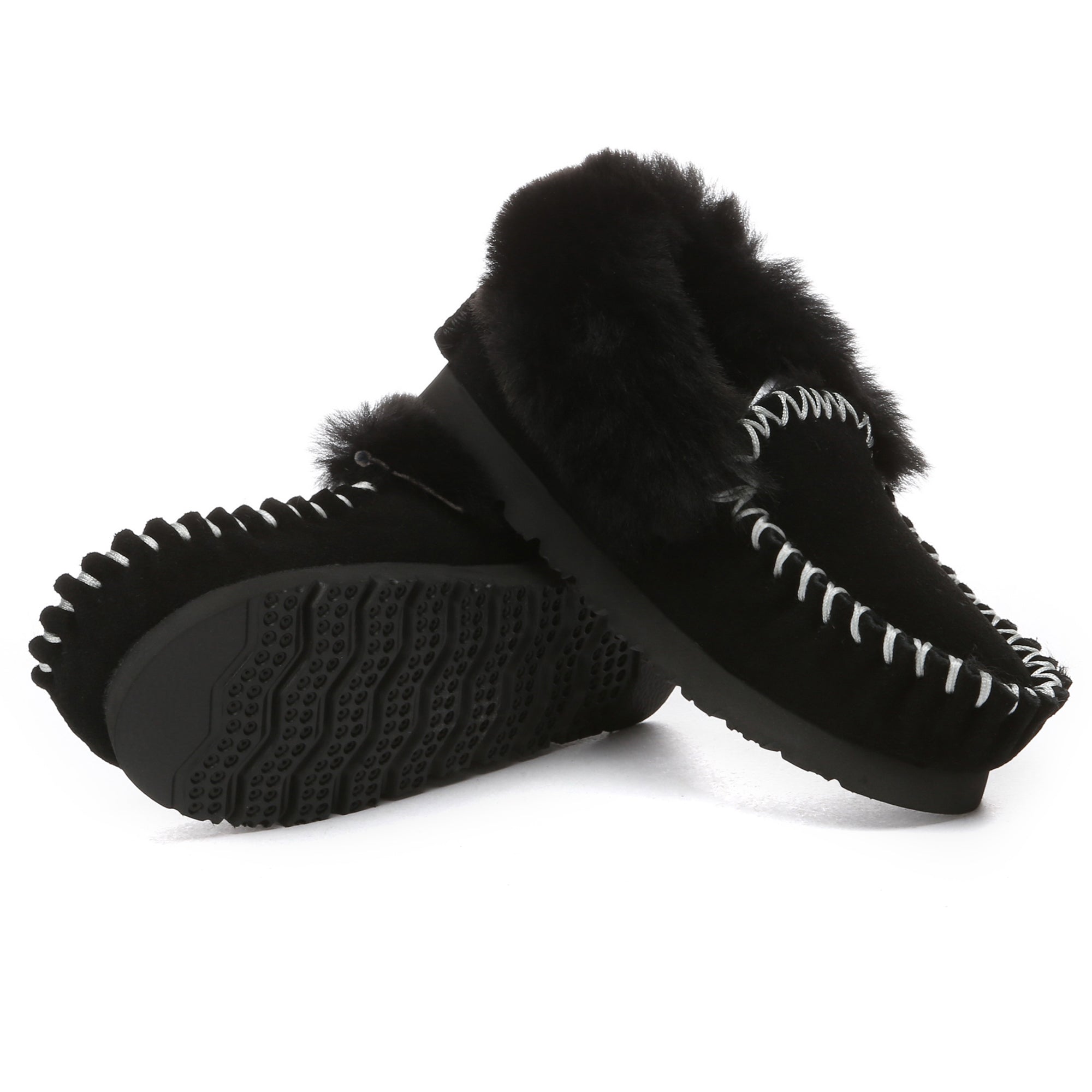 EverUgg kids' traditional moccasin slippers with soft leather and stitching, perfect for comfortable indoor wear.