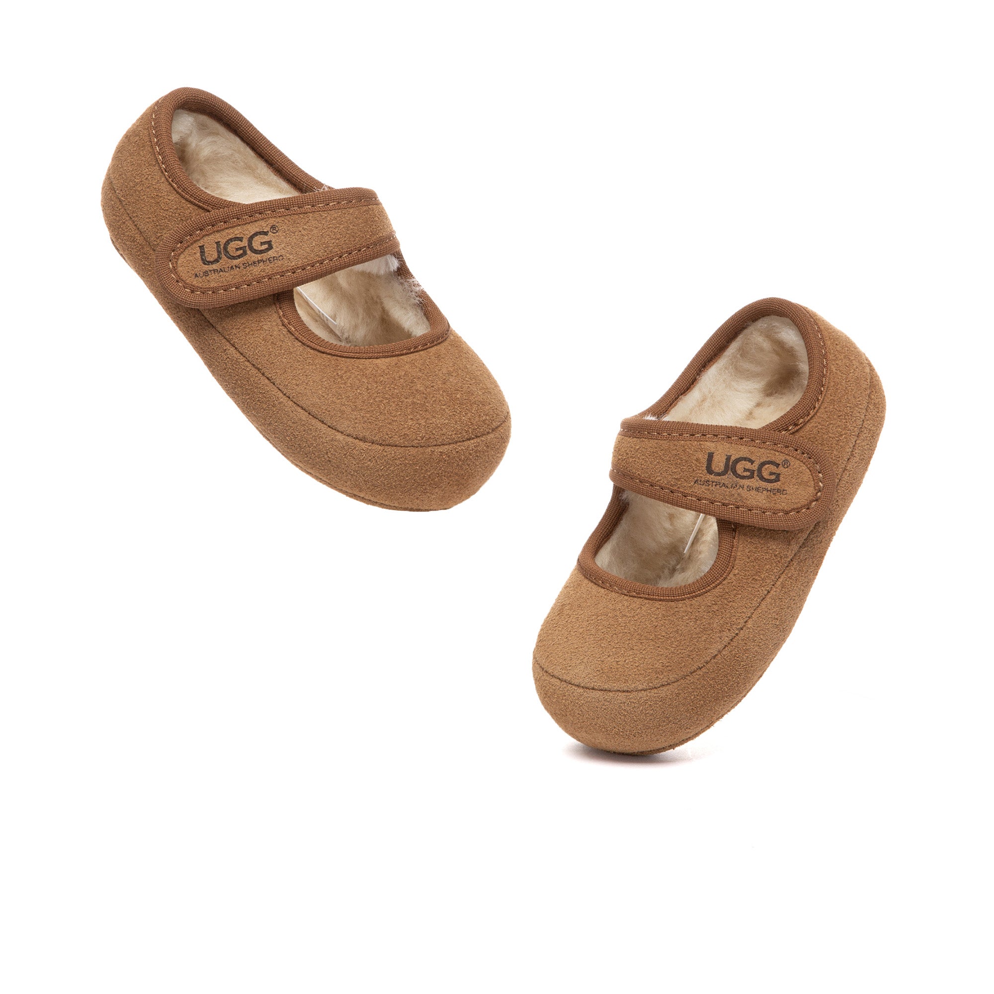 Toddler UGG Millie Mary Jane slippers in soft pink, featuring a cozy design and velcro strap for easy wear, from EverUgg.