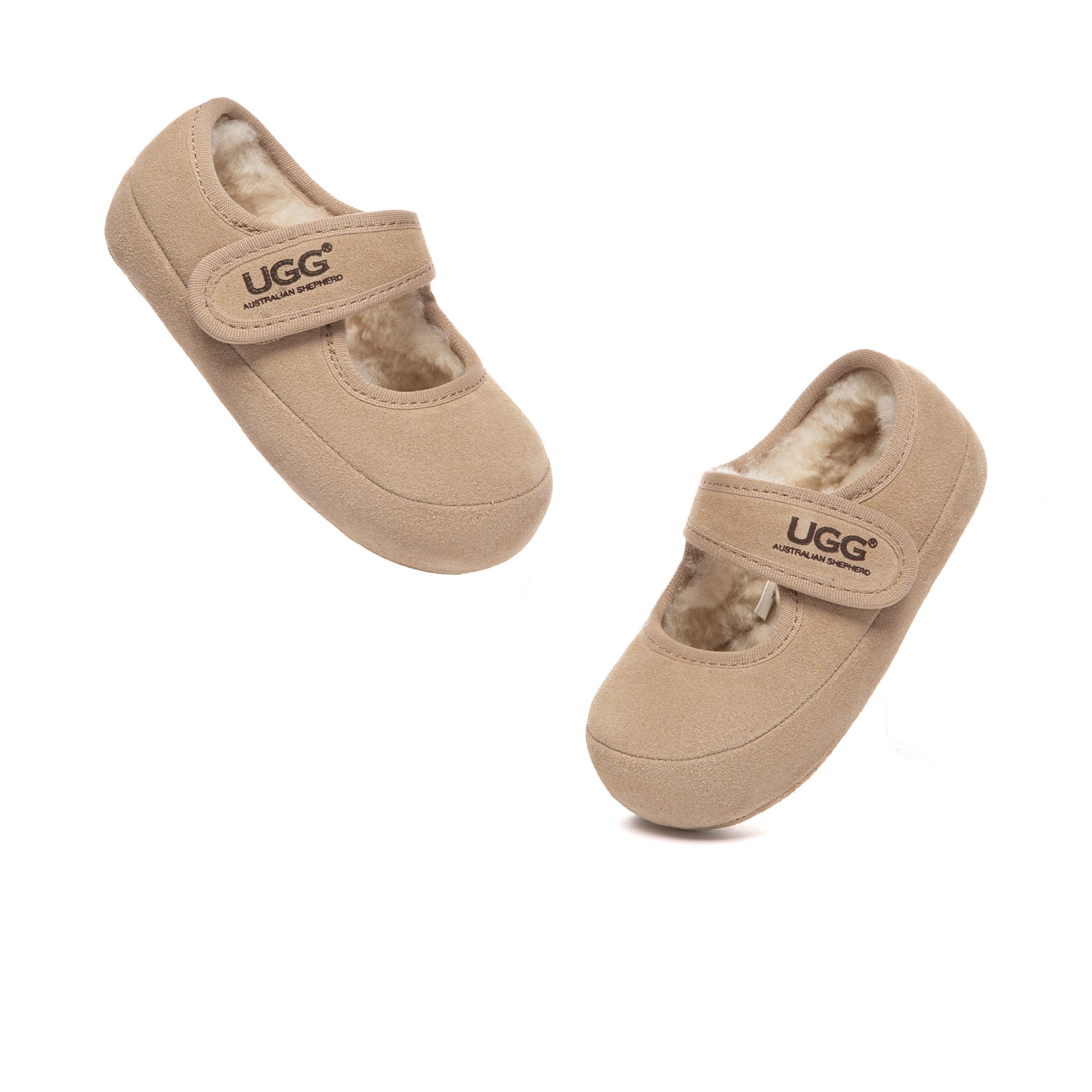 Toddler UGG Millie Mary Jane slippers in soft pink from EverUgg, featuring cozy plush material and classic design.