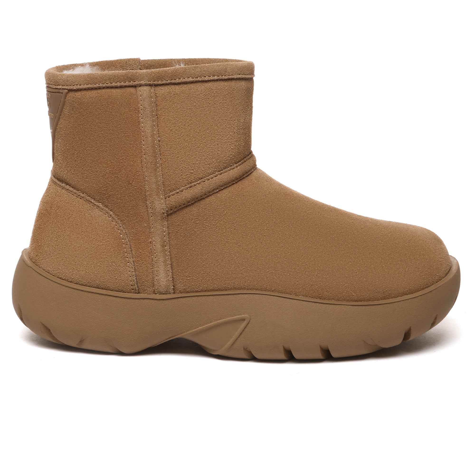 EverUgg UGG Mini Explorer Platform Boots showing tan suede exterior, rugged sole, and ankle height design.