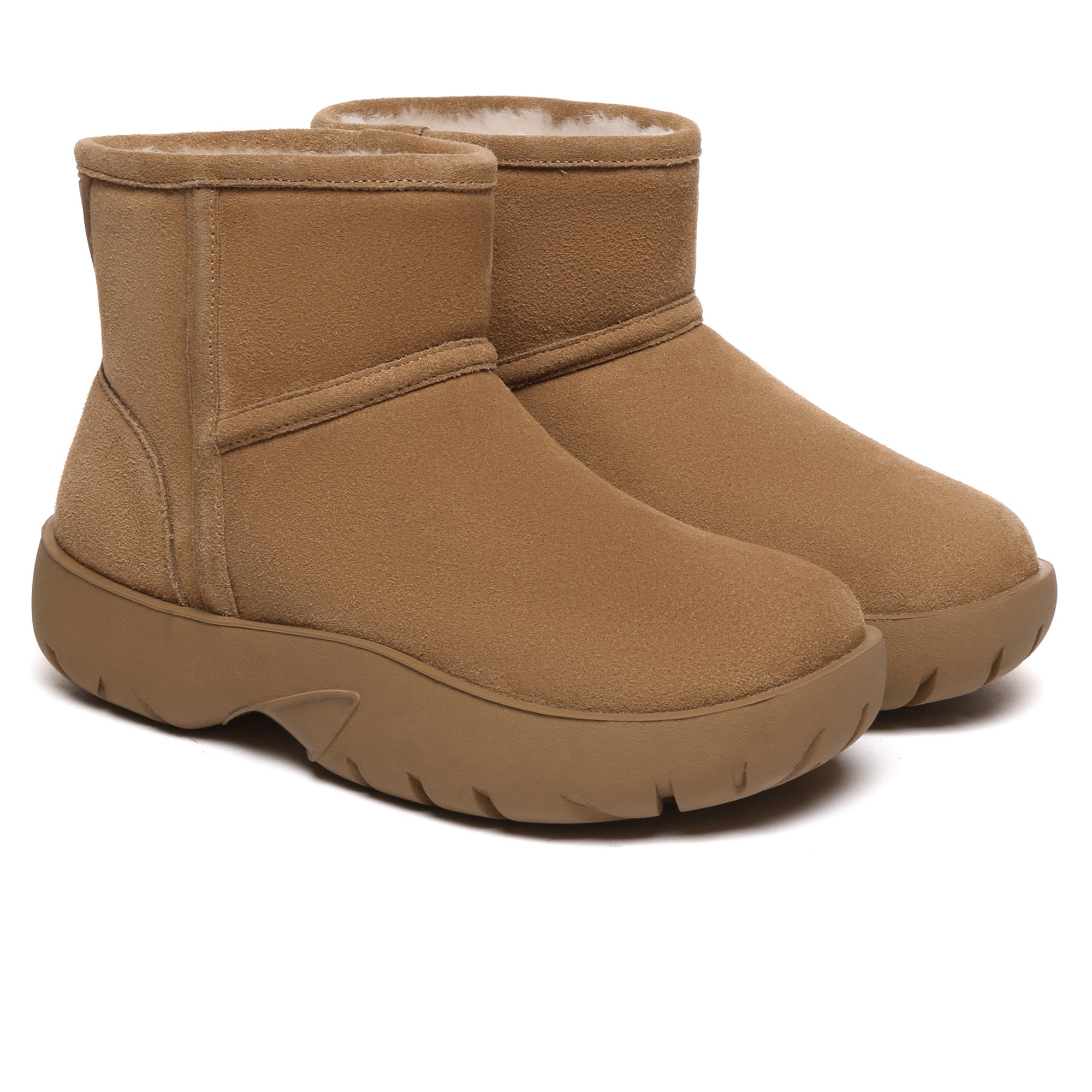 EverUgg UGG Mini Explorer Platform Boots in tan with laces and rugged sole, showcasing stylish ankle-length design.