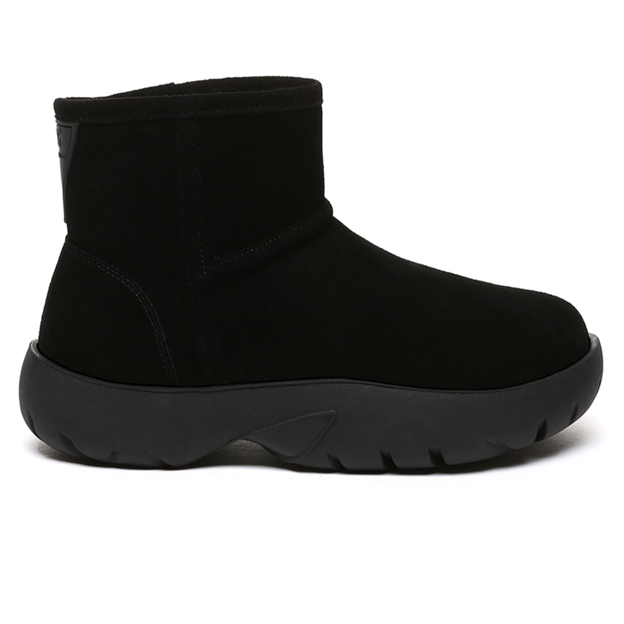 EverUgg UGG Mini Explorer Platform Boots in black leather with chunky soles and ankle height, styled for casual wear.