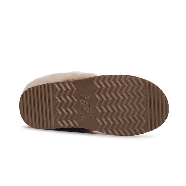 Auzland UGG platform ankle puffer slippers for women, featuring plush puffer design and slip-on style, shown in a cozy indoor setting.