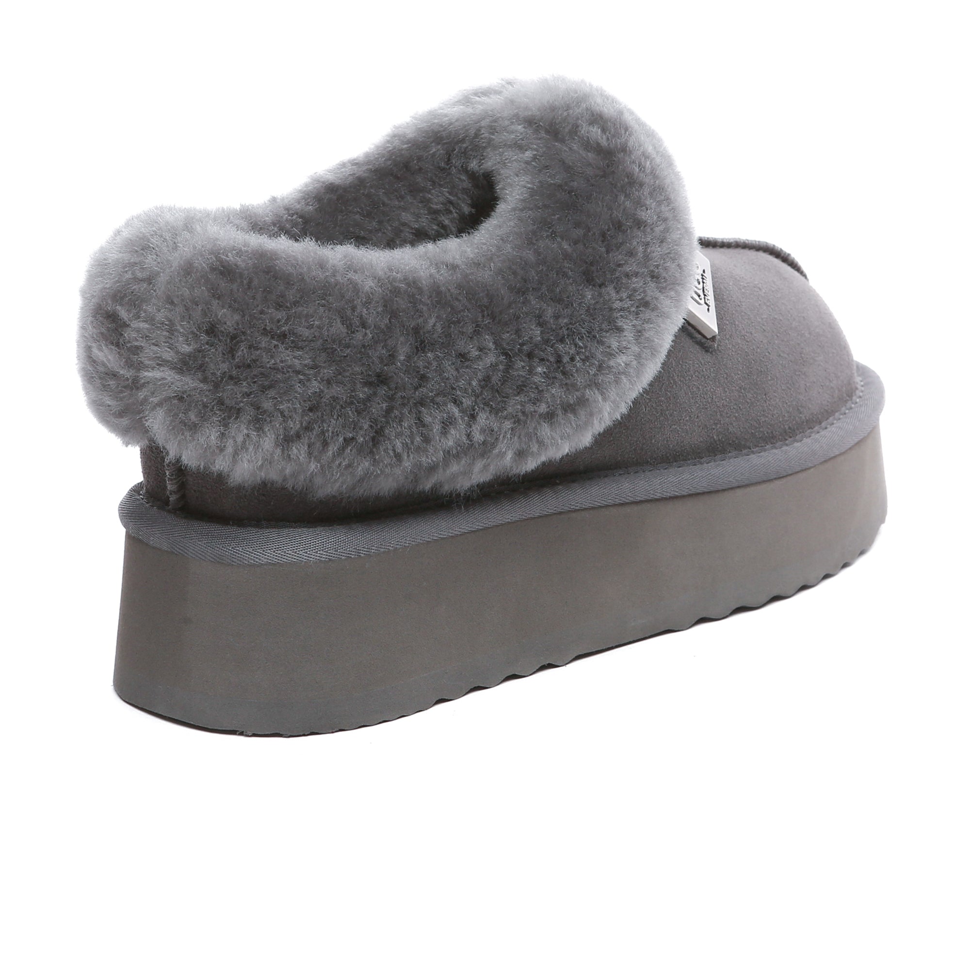 EverUgg UGG platform ankle slippers showcasing soft, cozy shoes with a stylish platform heel and ankle coverage.