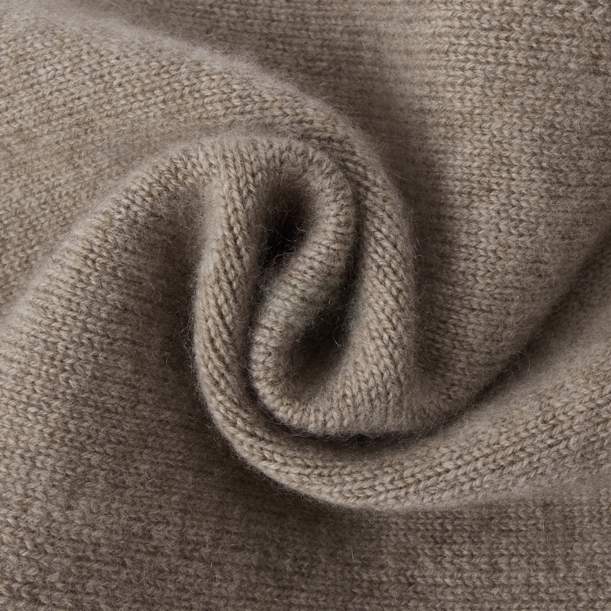 EverUgg UGG Premium Cashmere Scarf, soft and cozy beige scarf with fringed edges, perfect for stylish winter wear.