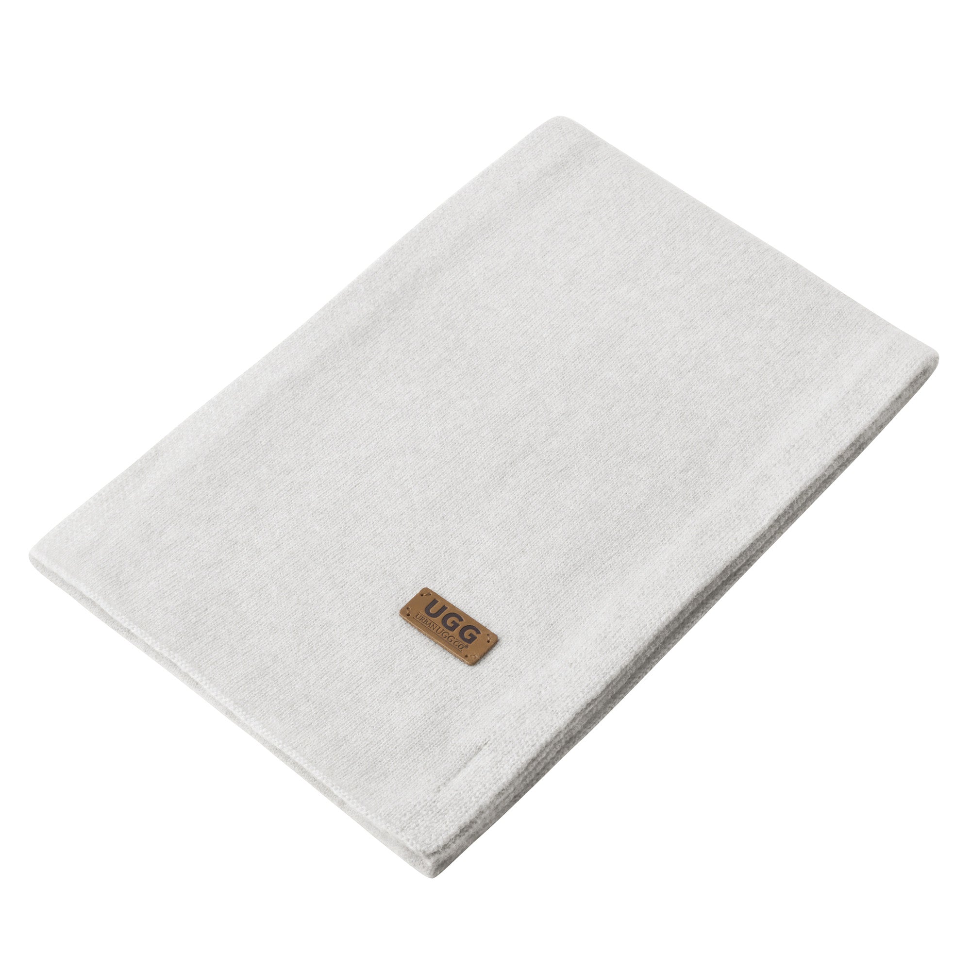 EverUgg UGG premium cashmere scarf displayed, showcasing soft, luxurious fabric and stylish drape in natural light.