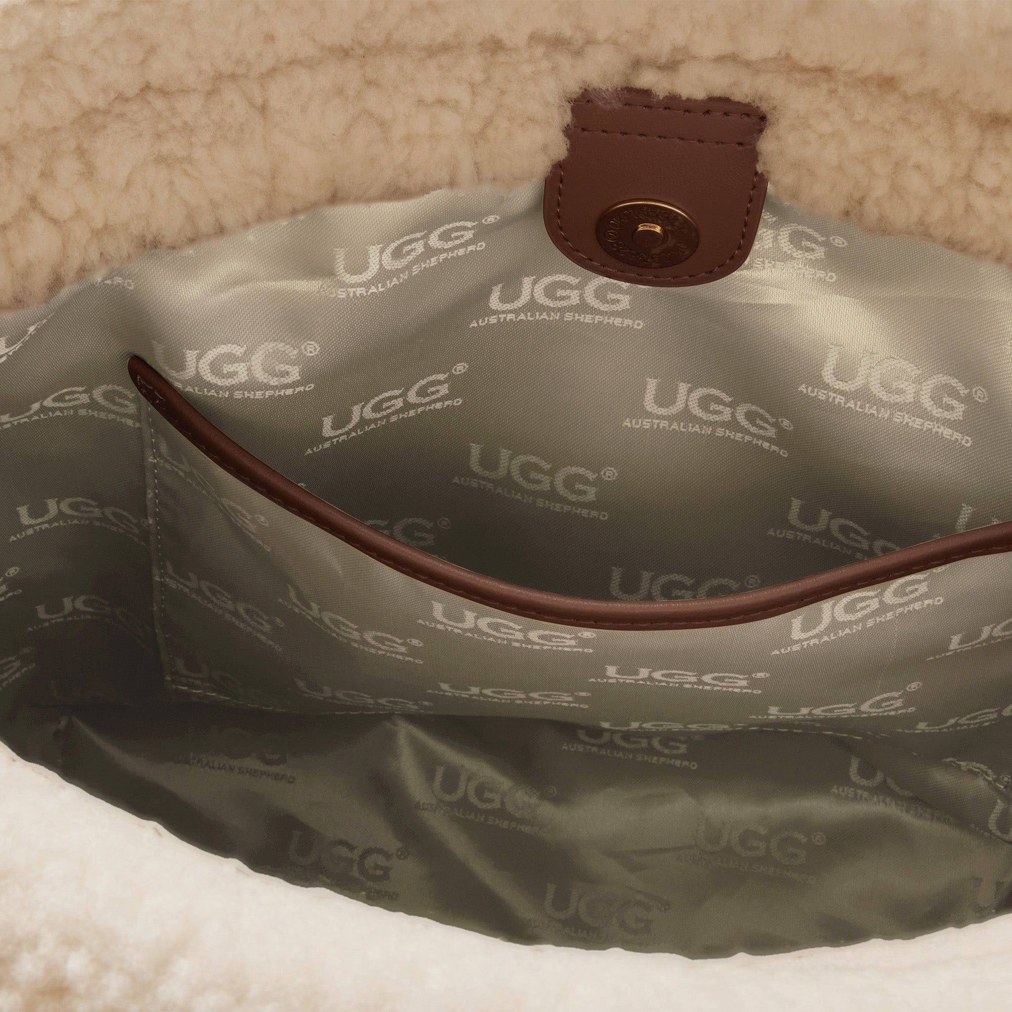 EverUgg shearling tote bag with soft, plush exterior and sturdy handles, perfect for stylish everyday use.