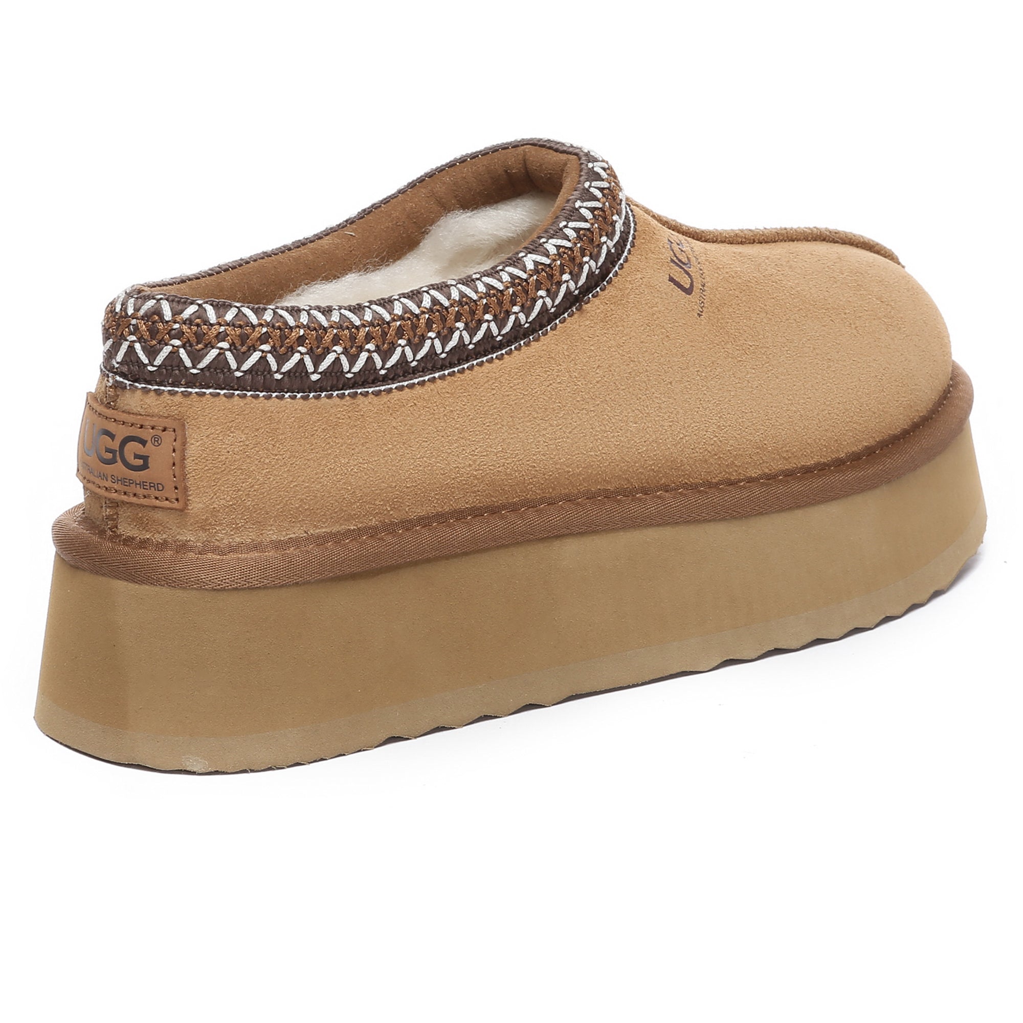 EverUgg Tazzy Platform Slippers with plush interior and slip-on design, styled with a tan suede exterior and chunky sole.