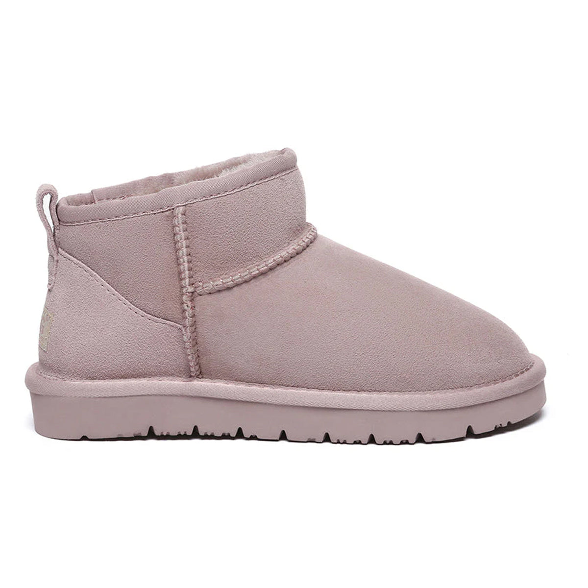 EverUgg women's Ultra Mini Classic UGG boots in dawn pink, soft sheepskin exterior and cozy interior for stylish comfort.