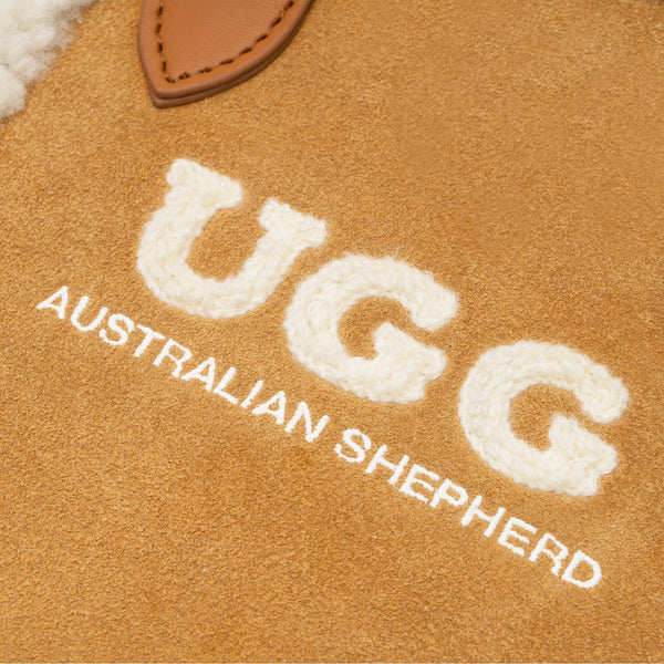 EverUgg wool bag with adjustable strap, soft textured accessories bag in neutral tones, perfect for casual use.