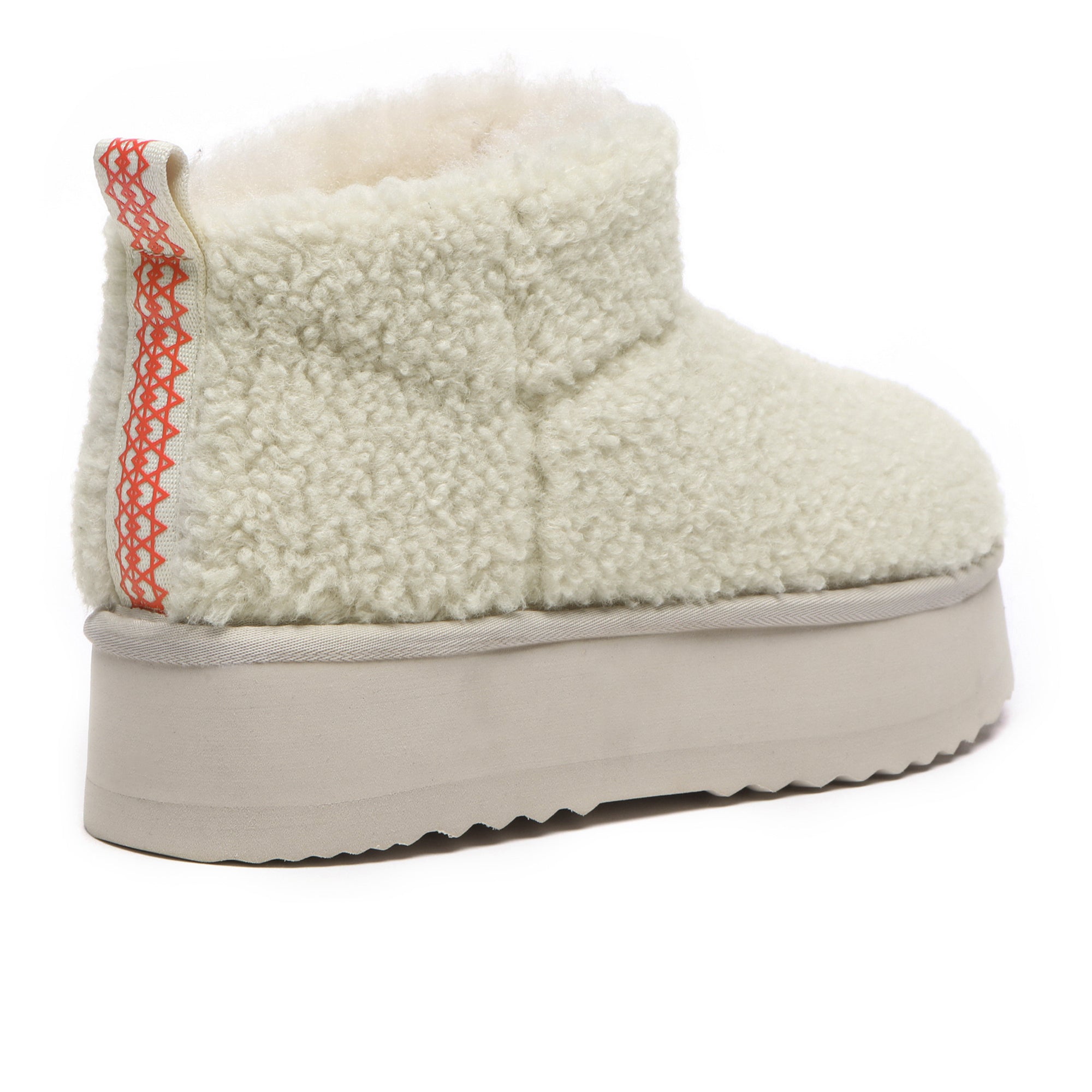 EverUgg Ultra Mini TeddyFluff UGG Boots in sand color with plush fur and platform sole, displayed on a neutral background.