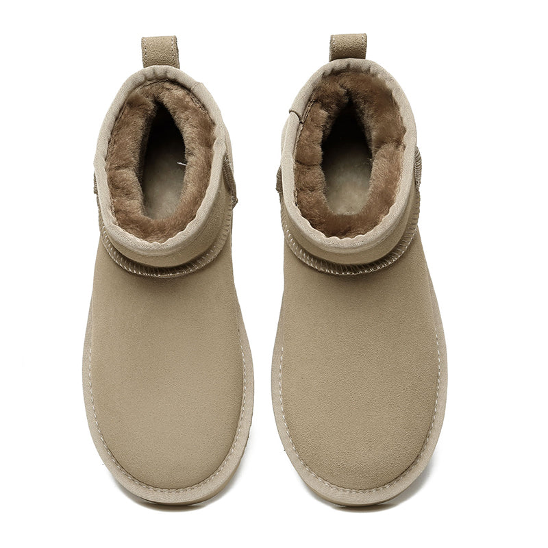 Light brown Ultra Mini UGG Boots for women by EverUgg, showcasing soft suede exterior and cozy shearling lining.
