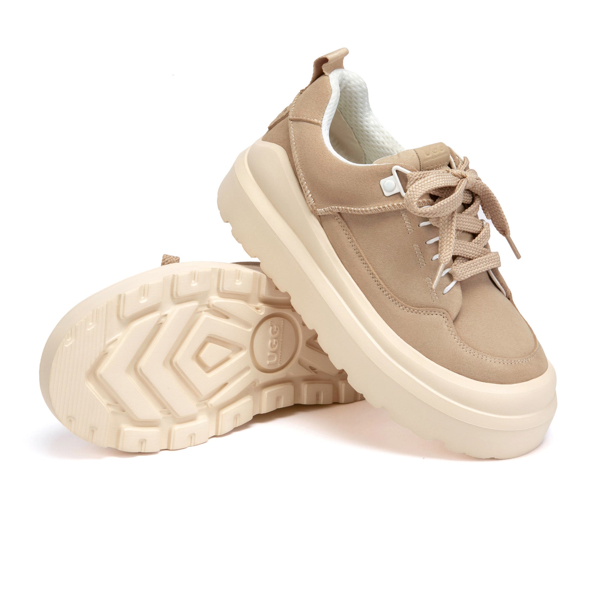 EverUgg Versatile Sneakers featuring a sleek design with breathable fabric and comfortable rubber sole for everyday wear.