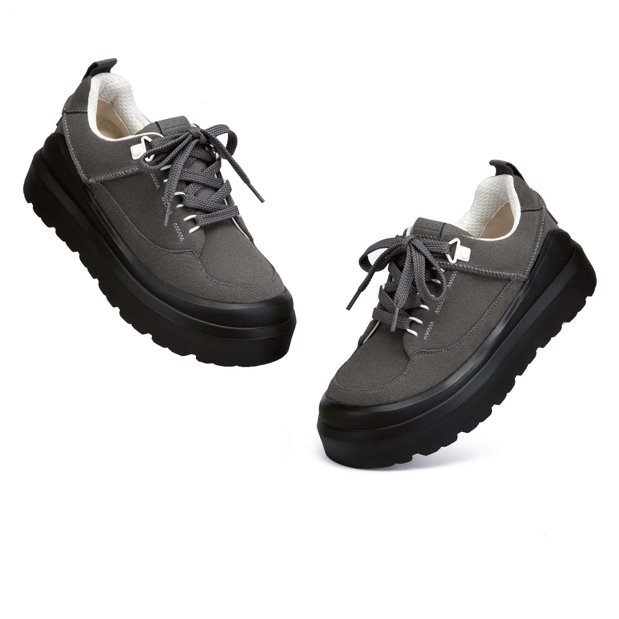 EverUgg versatile sneakers in neutral tones with a sleek design and comfortable laces, perfect for casual everyday wear.