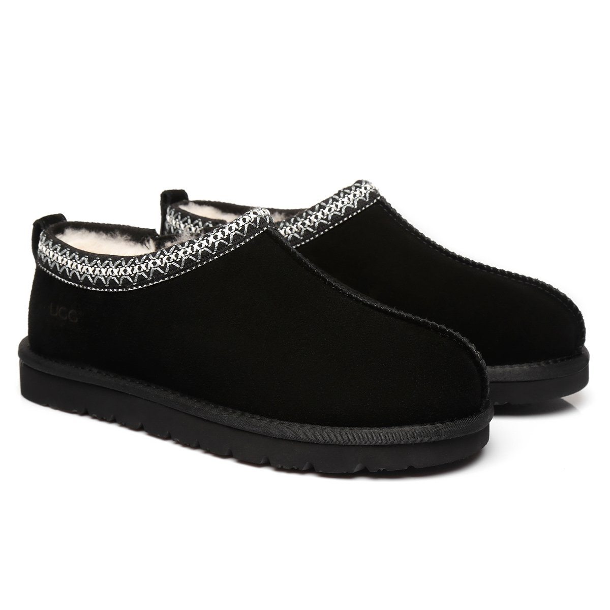 EverUgg Vince men's UGG slippers with plush sheepskin lining and suede exterior, shown in a cozy indoor setting.