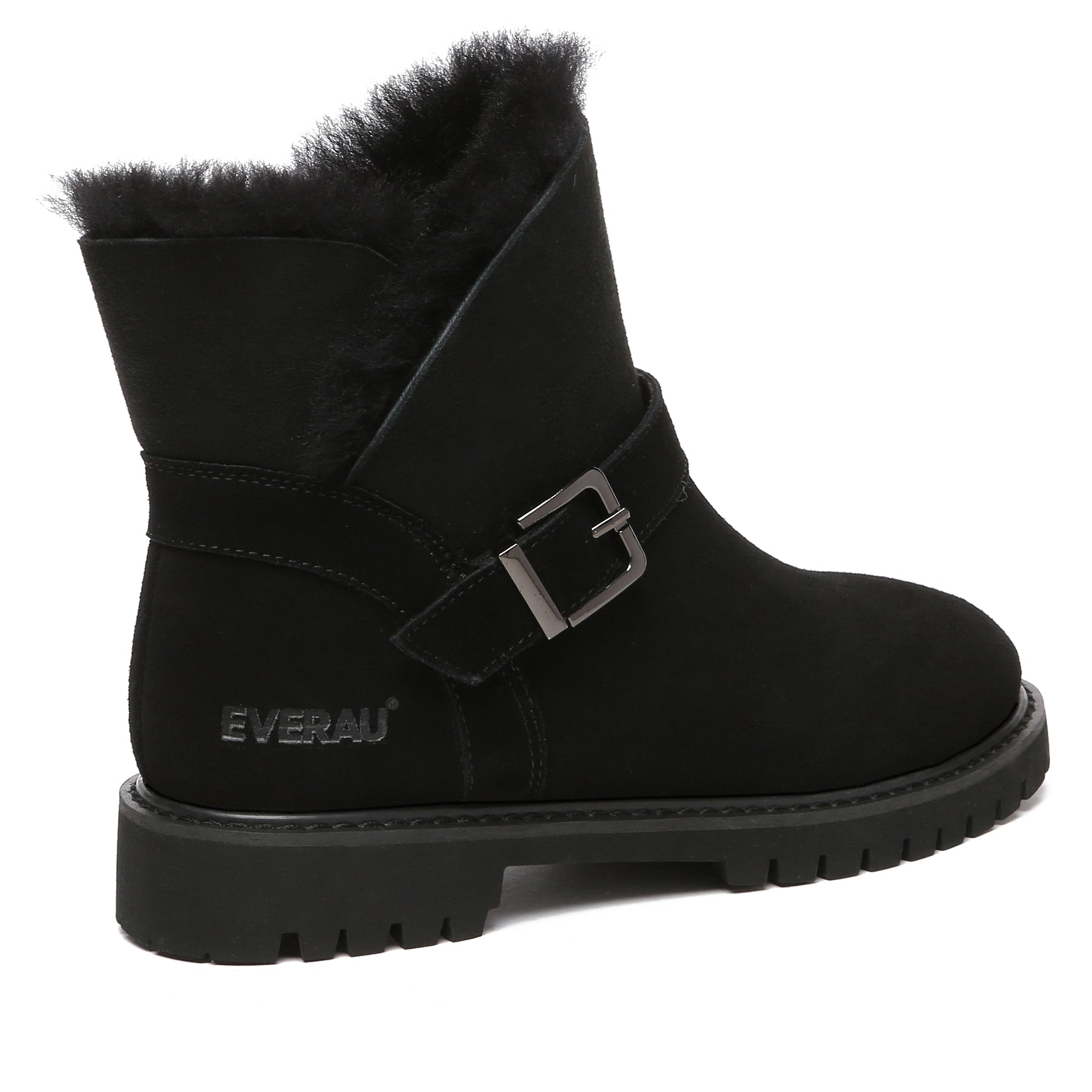 Black women buckle mini UGG boots by EverUgg featuring a stylish buckle detail and cozy sheepskin lining.
