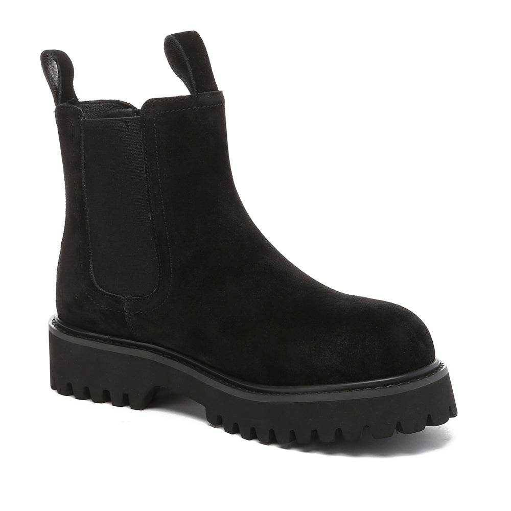Black women's Chelsea boots by EverUgg featuring sleek leather design and elastic side panels for a stylish, comfortable fit.