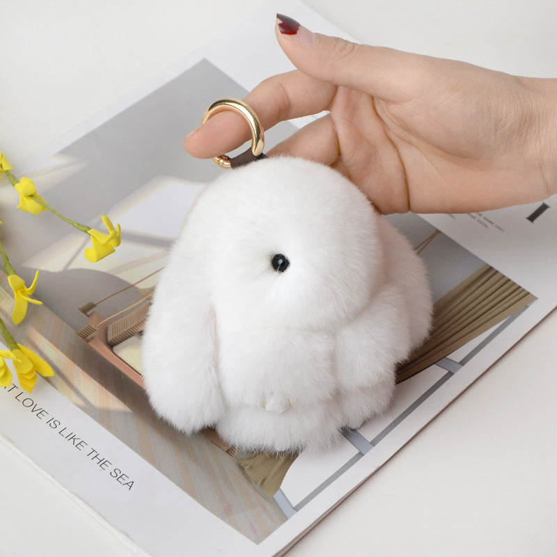 Snuggyz bunny keychain featuring a cute plush bunny design, perfect for keys or bags.