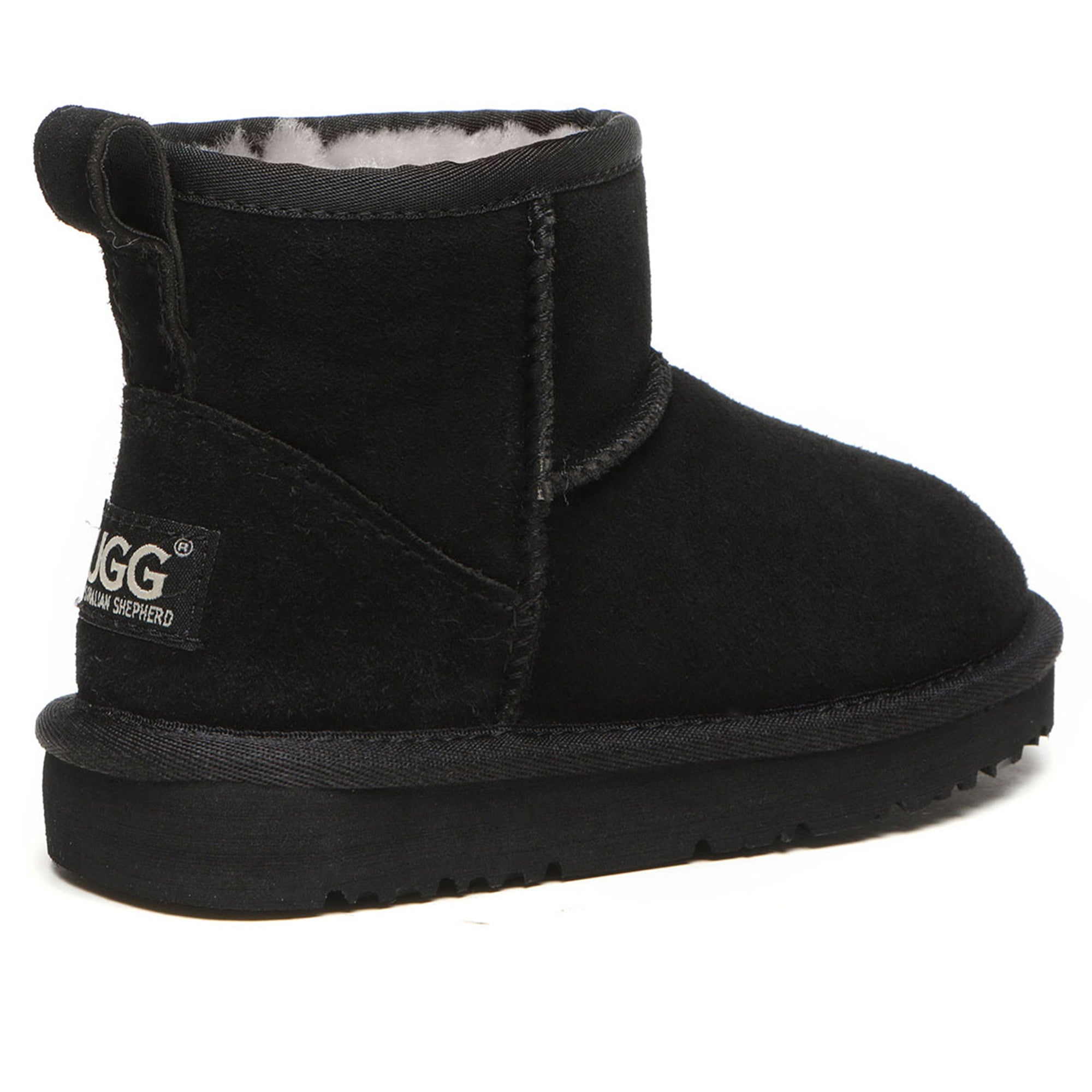 Close-up of classic mini kids UGG boots by EverUgg, showcasing soft suede material and cozy fur lining.