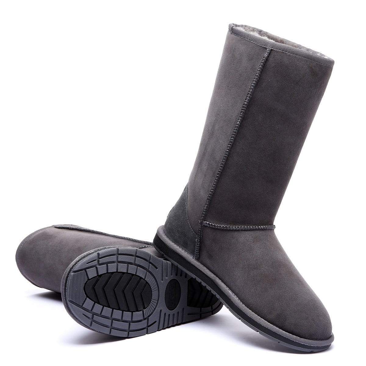 EverUgg Classic Tall UGG Boots for women, soft sheepskin interior, and tan leather exterior, shown on a model's feet.