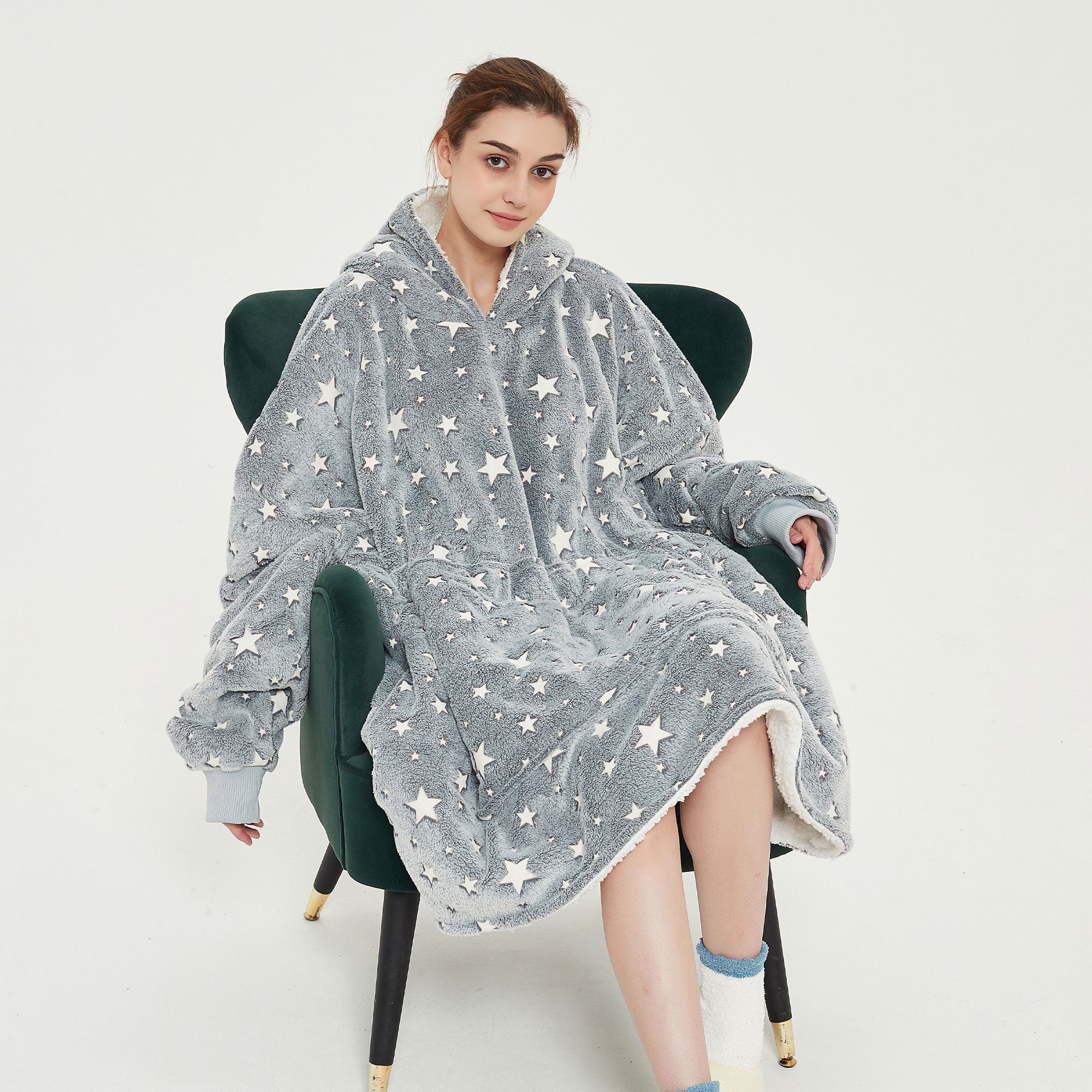 Snuggyz glow-in-the-dark stars hoodie blanket featuring a cozy hoodie and blanket with star designs for comfortable, stylish warmth.