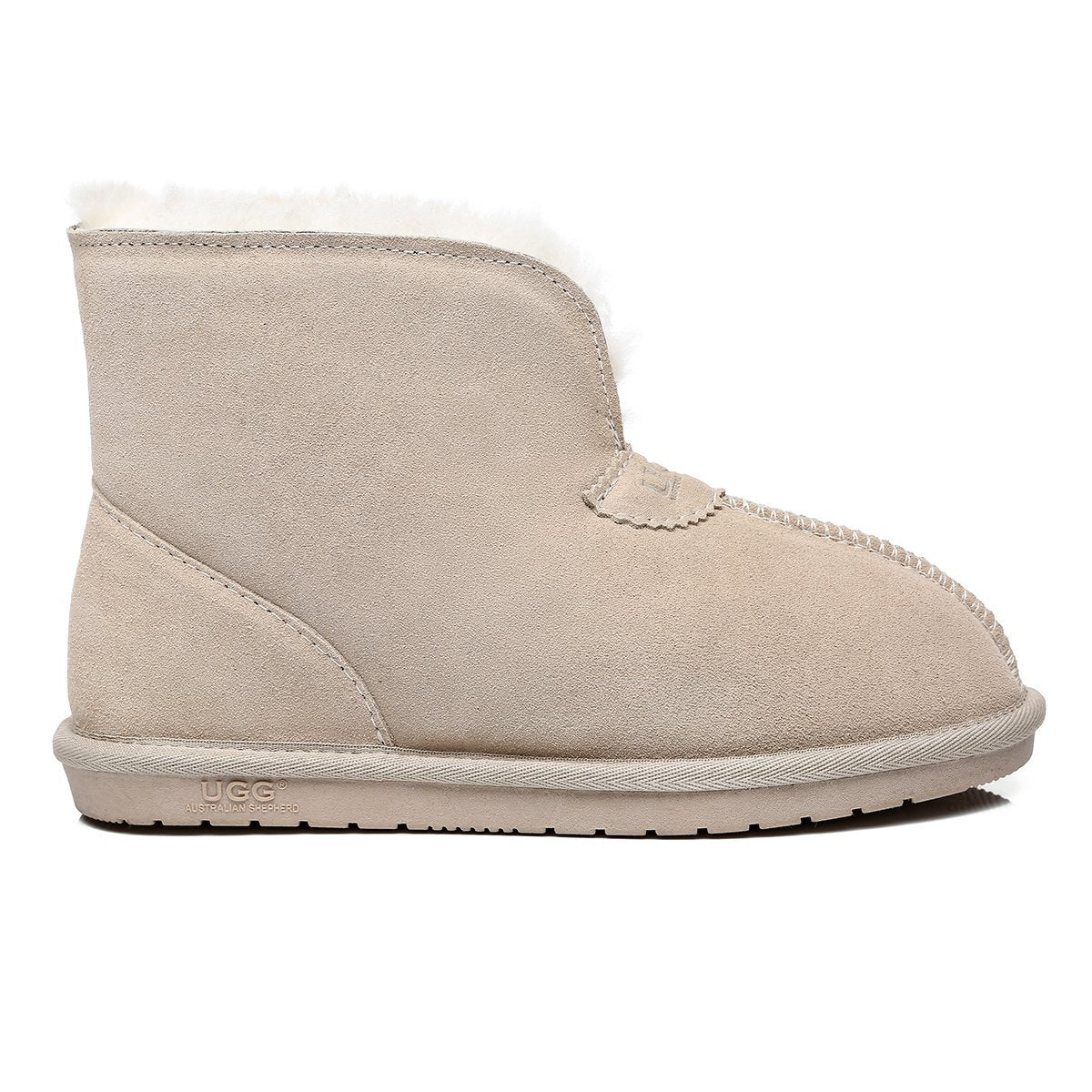 EverUgg Jonah unisex slippers with double-face sheepskin in sand color, showing the cozy slide design and plush interior.