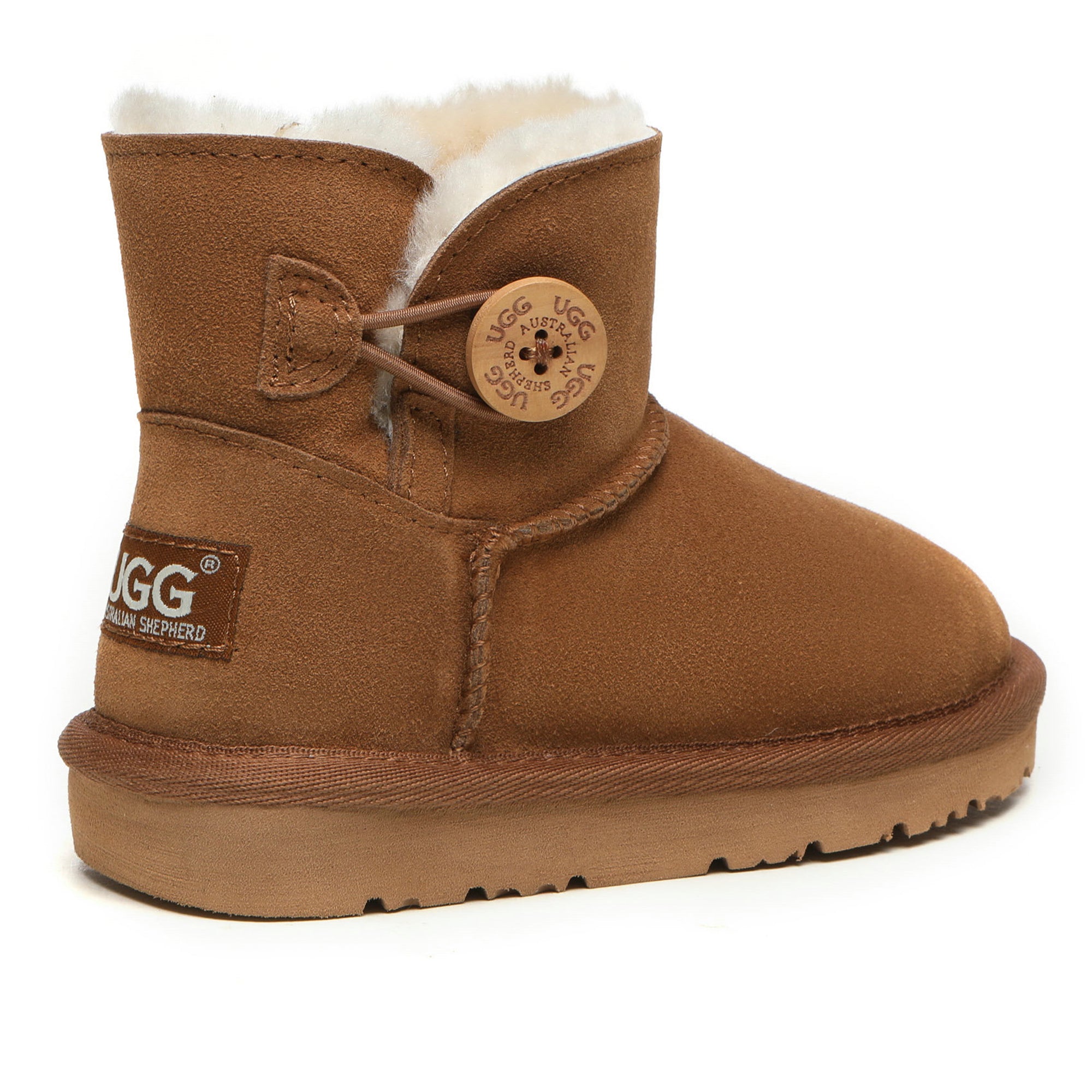 Mini UGG boots for kids by EverUgg with decorative buttons and soft, cozy exterior in a close-up shot.