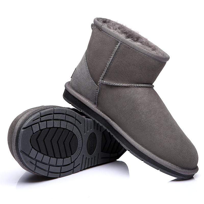 Pair of EverUgg Mini Classic UGG Boots for women, showcasing soft suede material and cozy sheepskin lining.