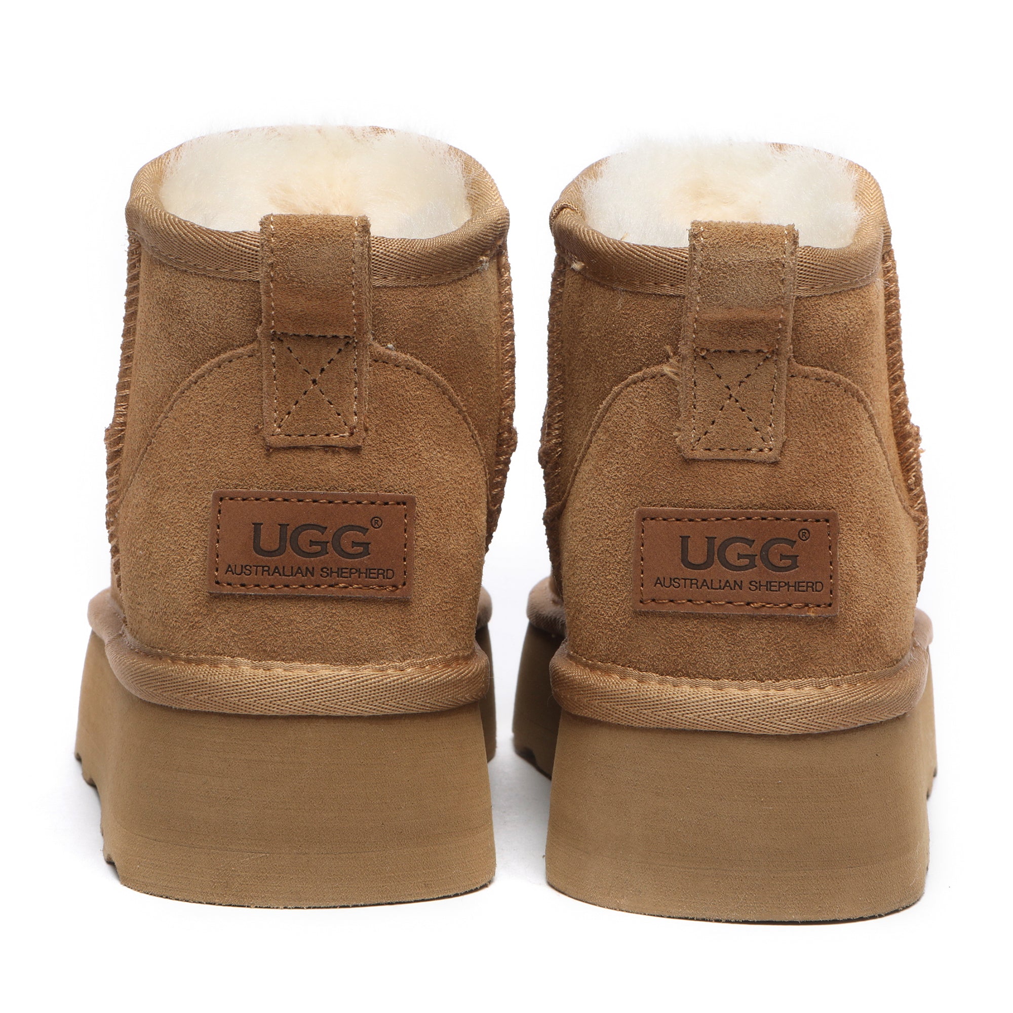 EverUgg Premium Platform Mini UGG Boots in chestnut with plush lining, showcasing the stylish ankle-length design and textured sole.